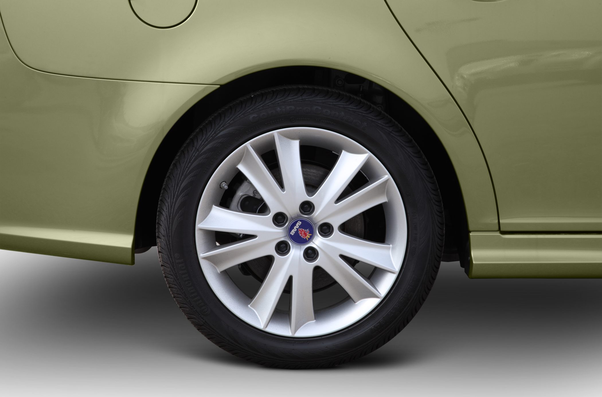 Alloy wheel and rear quarter panel with tire of a car