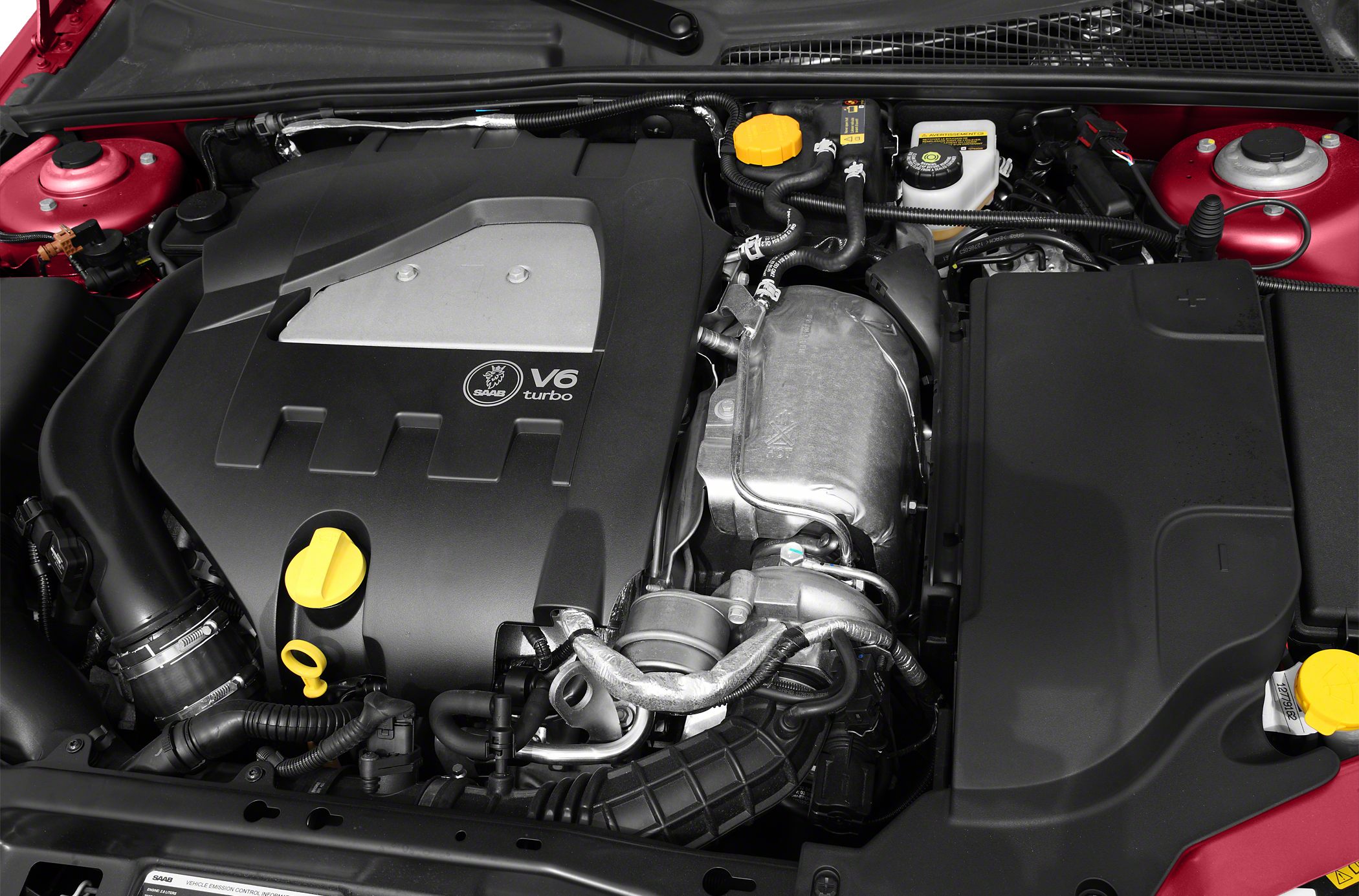 V6 turbo engine with cover and fluid reservoirs in engine bay