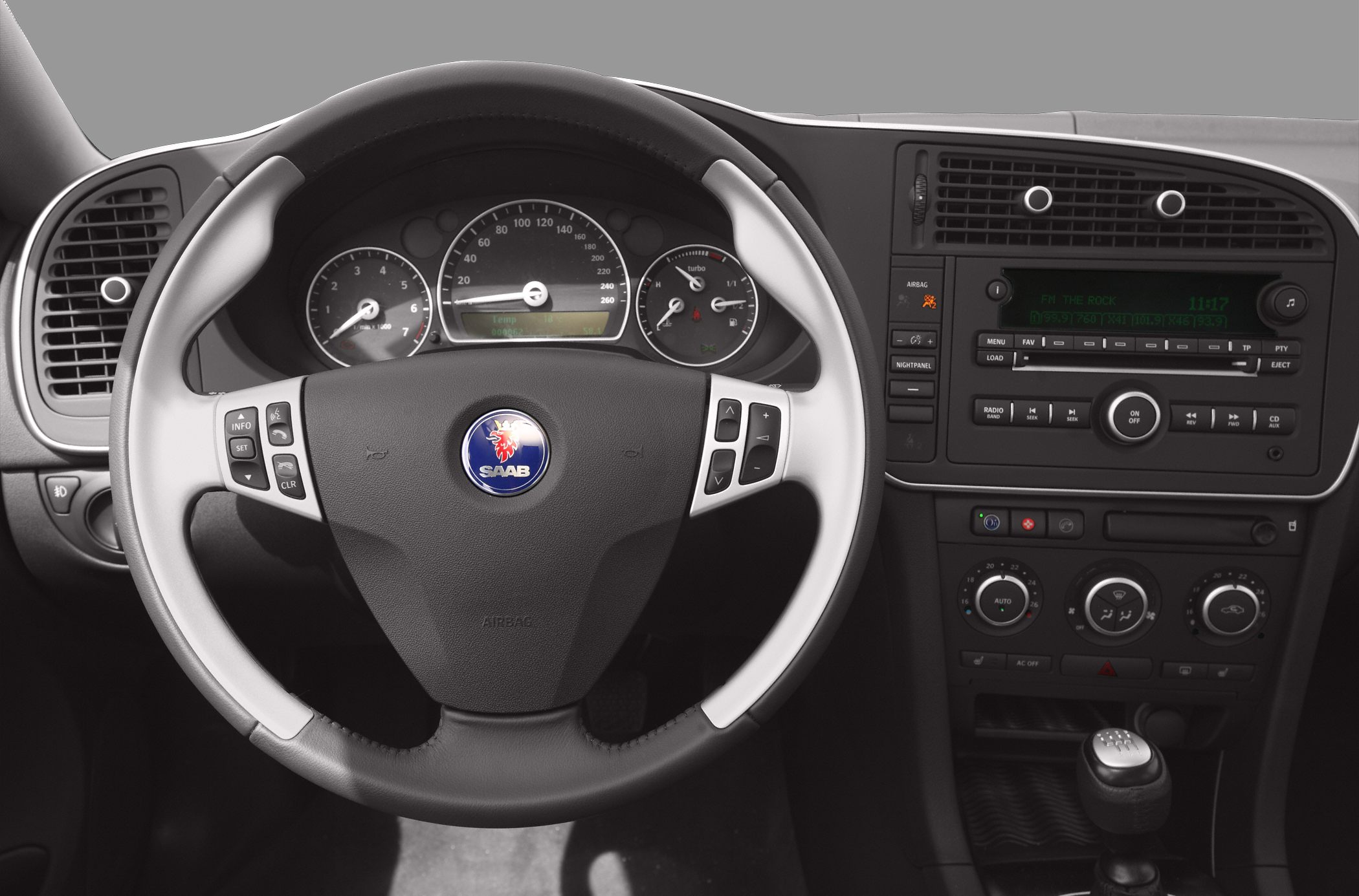 Steering wheel, instrument cluster, and center console with manual gearshift