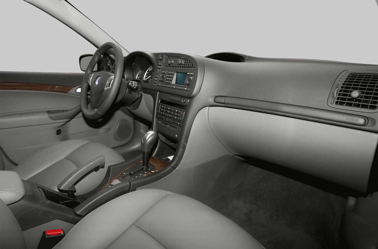 Interior dashboard with steering wheel and gear shifter