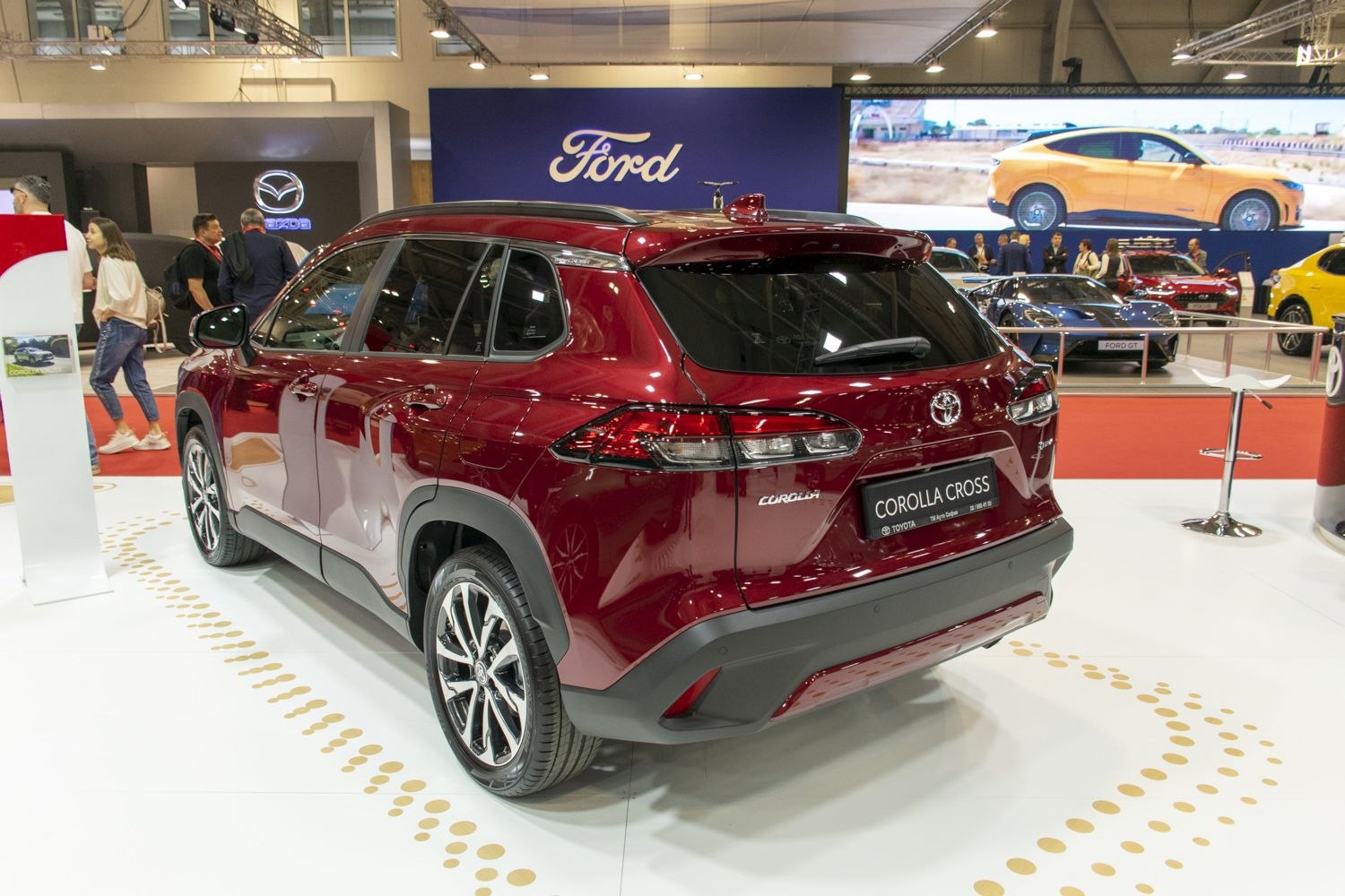 Rear view of modern SUV with distinctive rear lights and multi-spoke alloy wheels