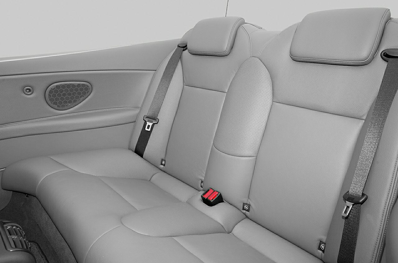 Rear leather seats with seat belts and headrests