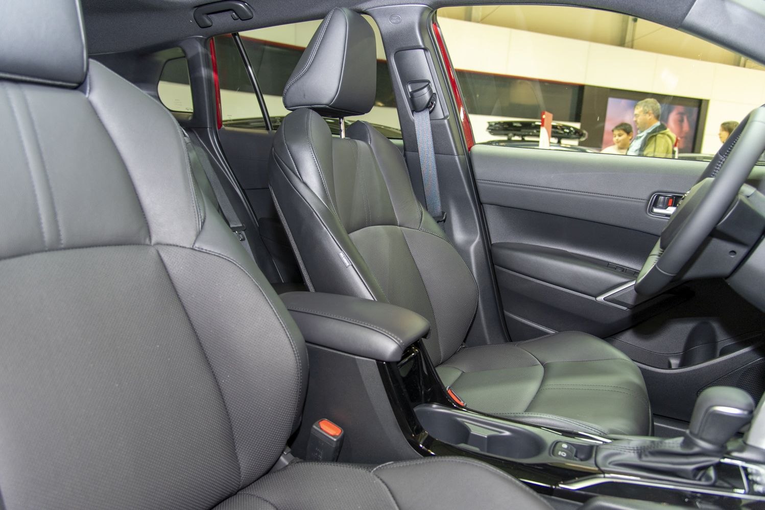 Modern premium front seats with center console and door panel