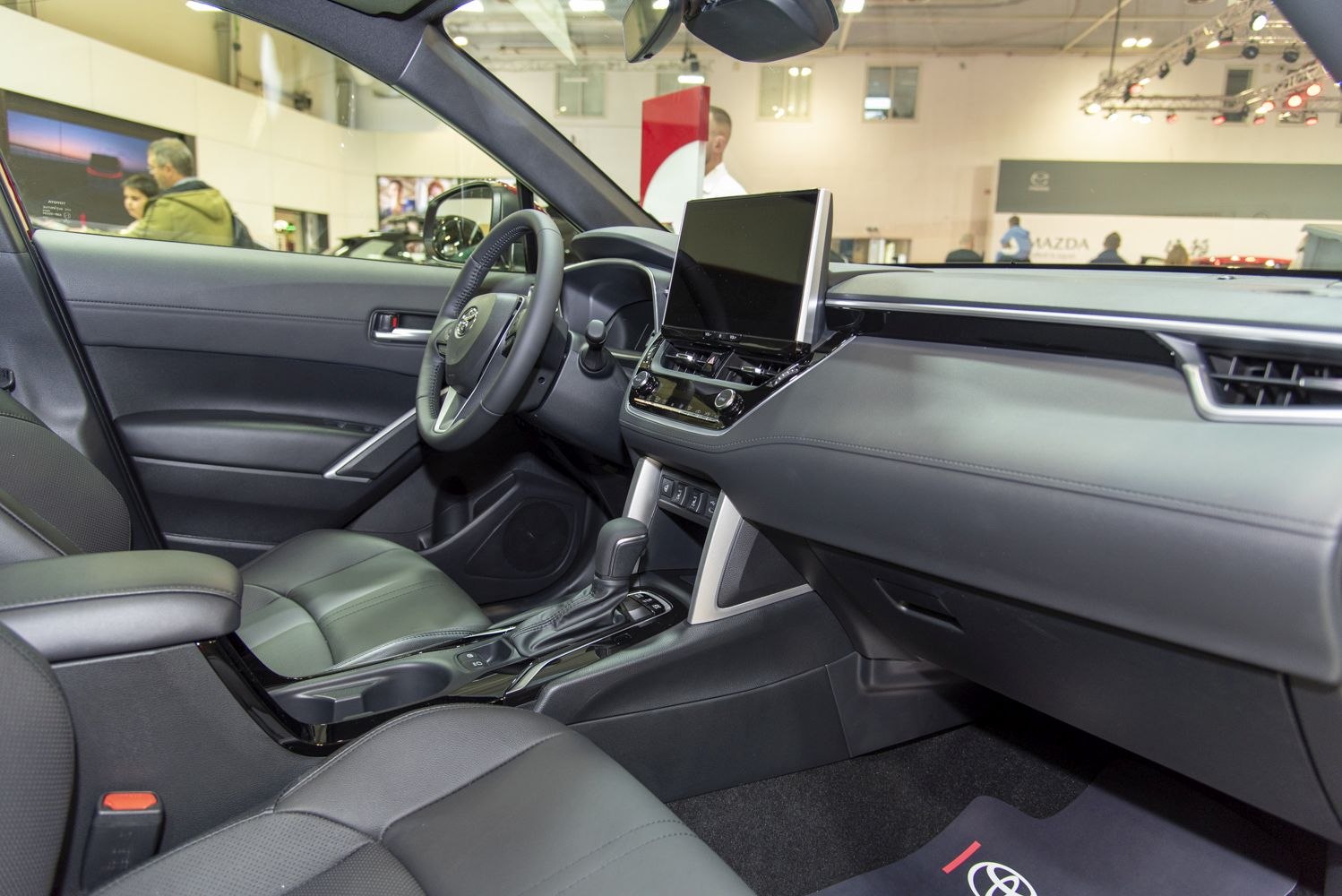 Modern dashboard with touchscreen display and leather seats