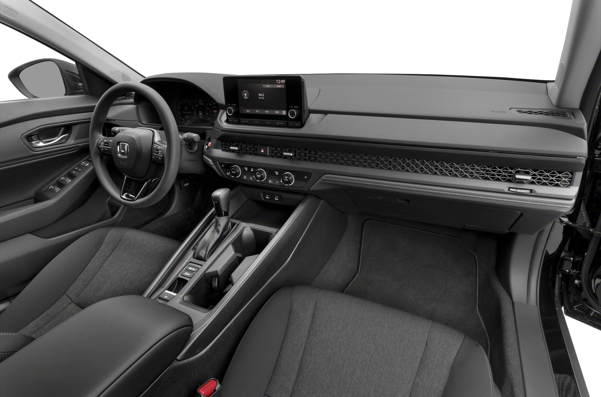 Modern dashboard and multifunction steering wheel in car interior