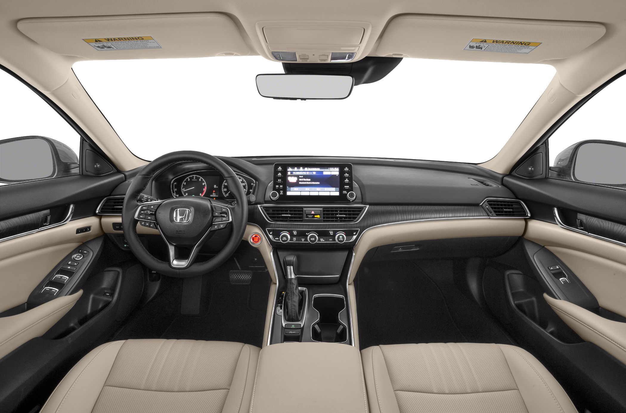 Modern dashboard with steering wheel controls and infotainment screen.