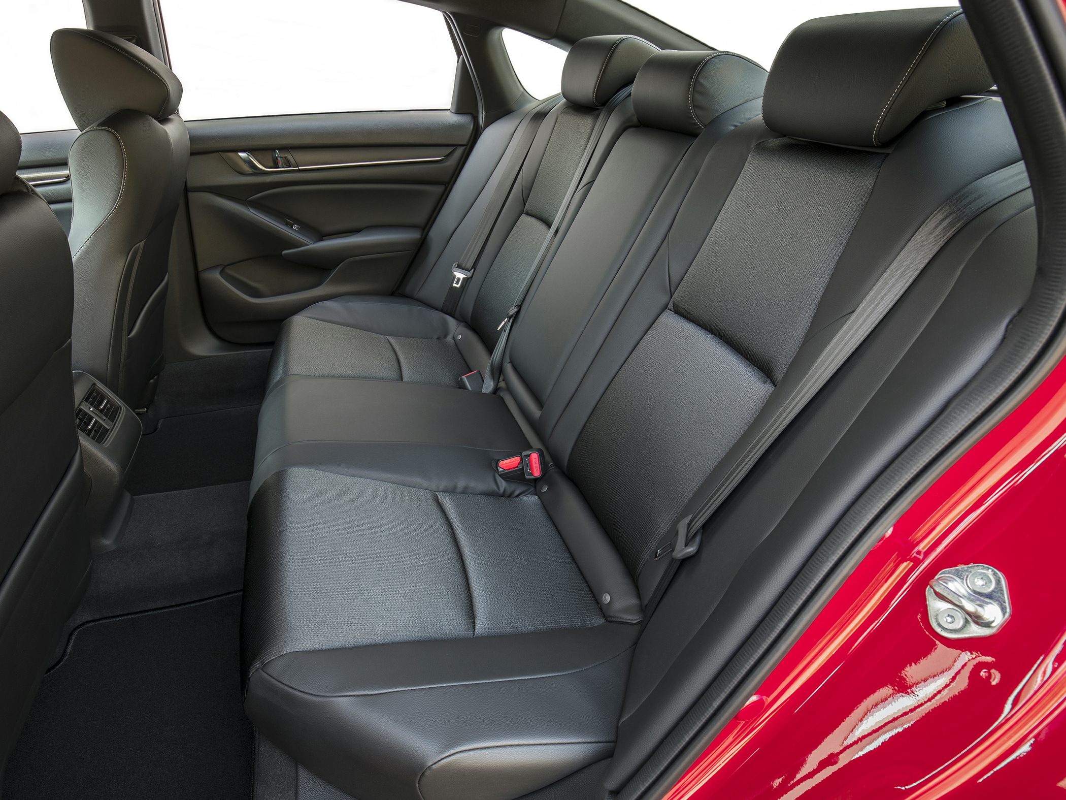 Black rear seats with modern upholstery and seat belts