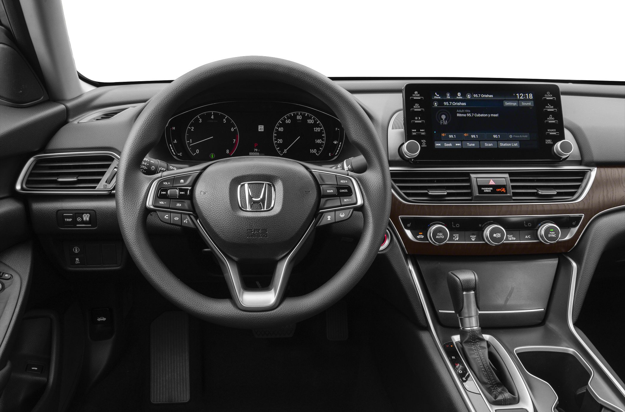 Steering wheel, dashboard, infotainment screen, and center console layout