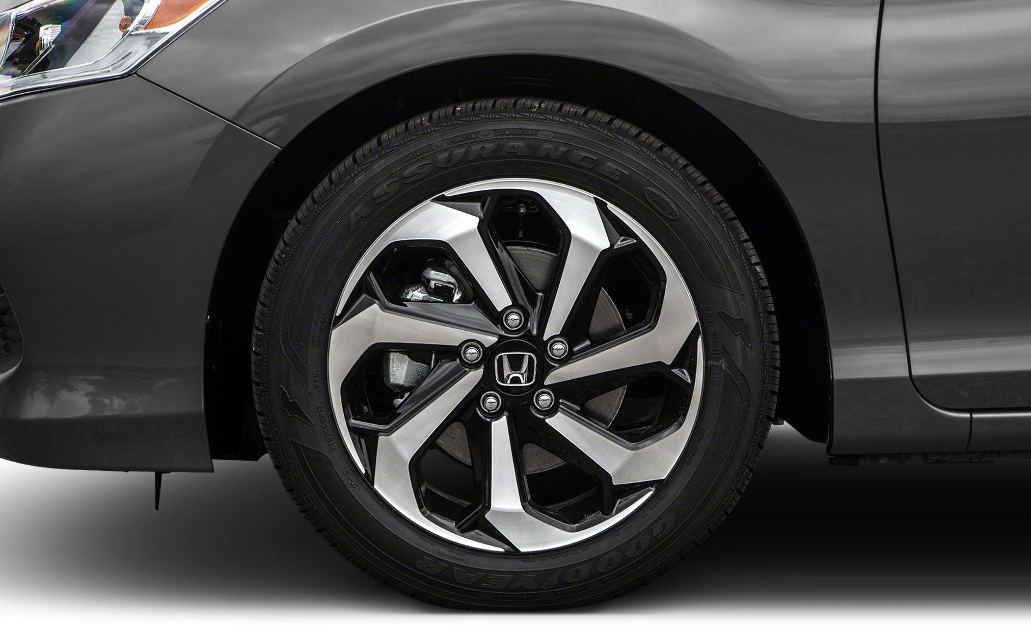 Close-up of modern multi-spoke alloy wheel and tire