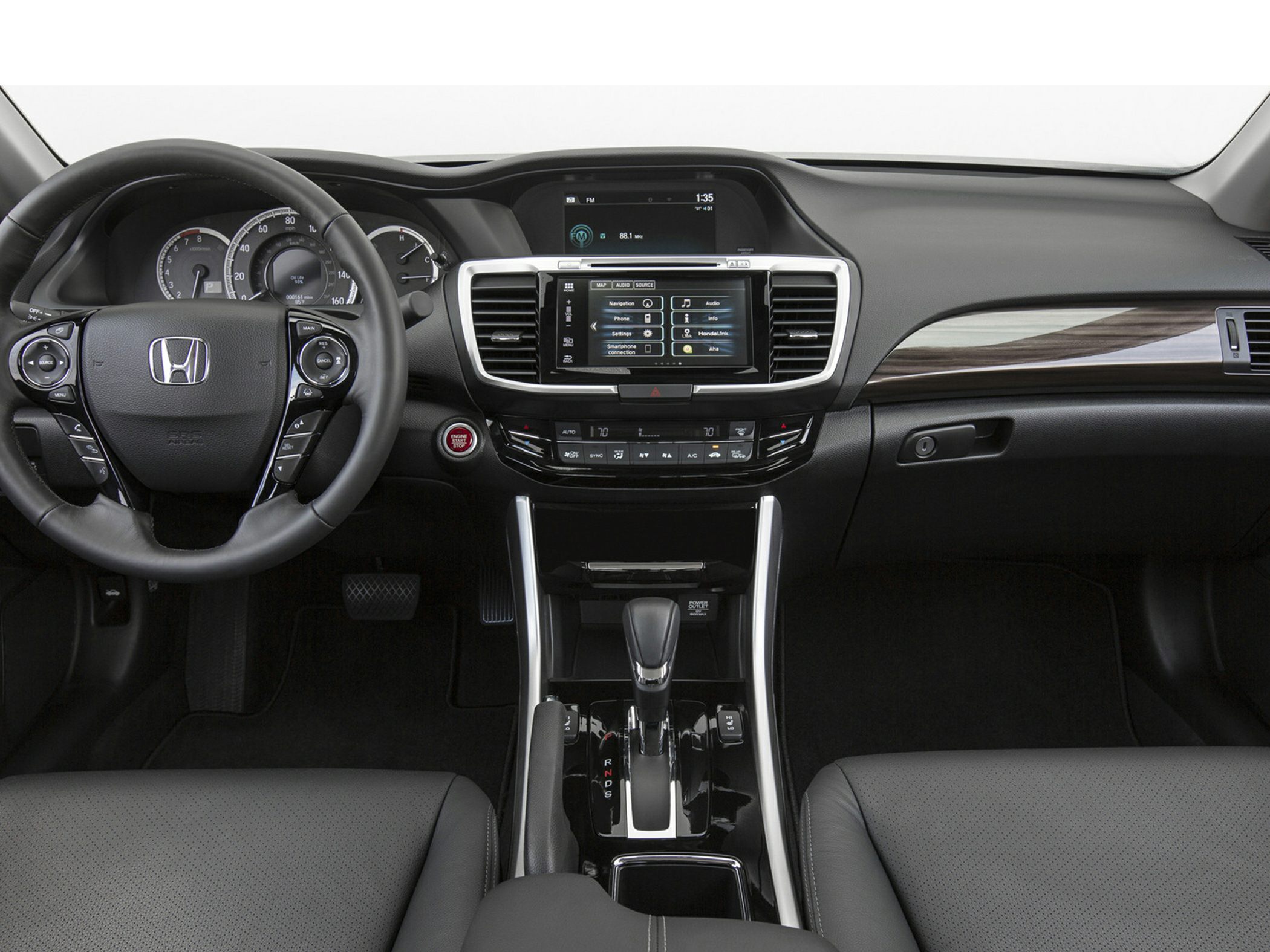 Steering wheel, dashboard, center console with touchscreen multimedia and gear shift