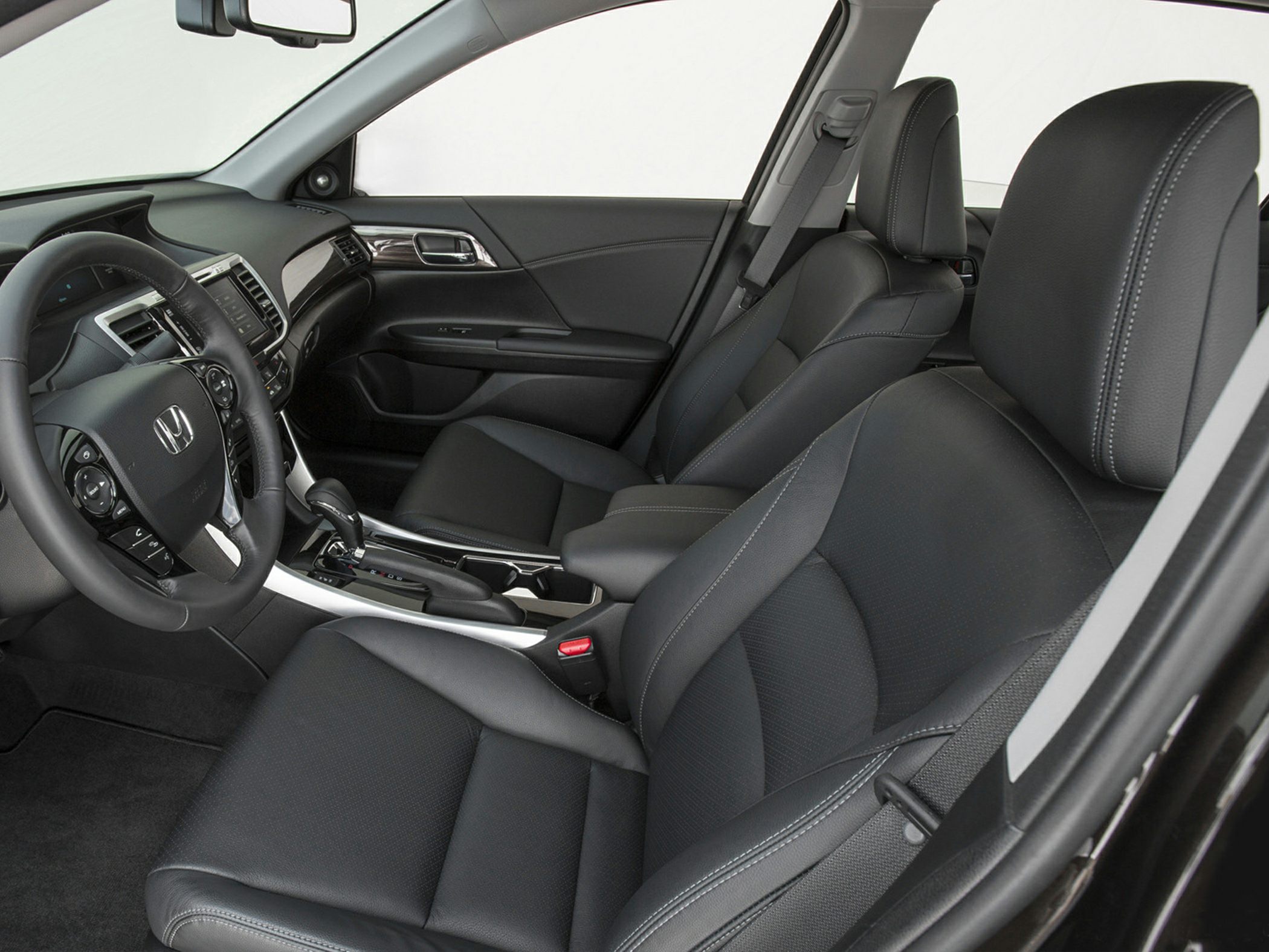 Black leather seats and modern dashboard interior with automatic gearshift