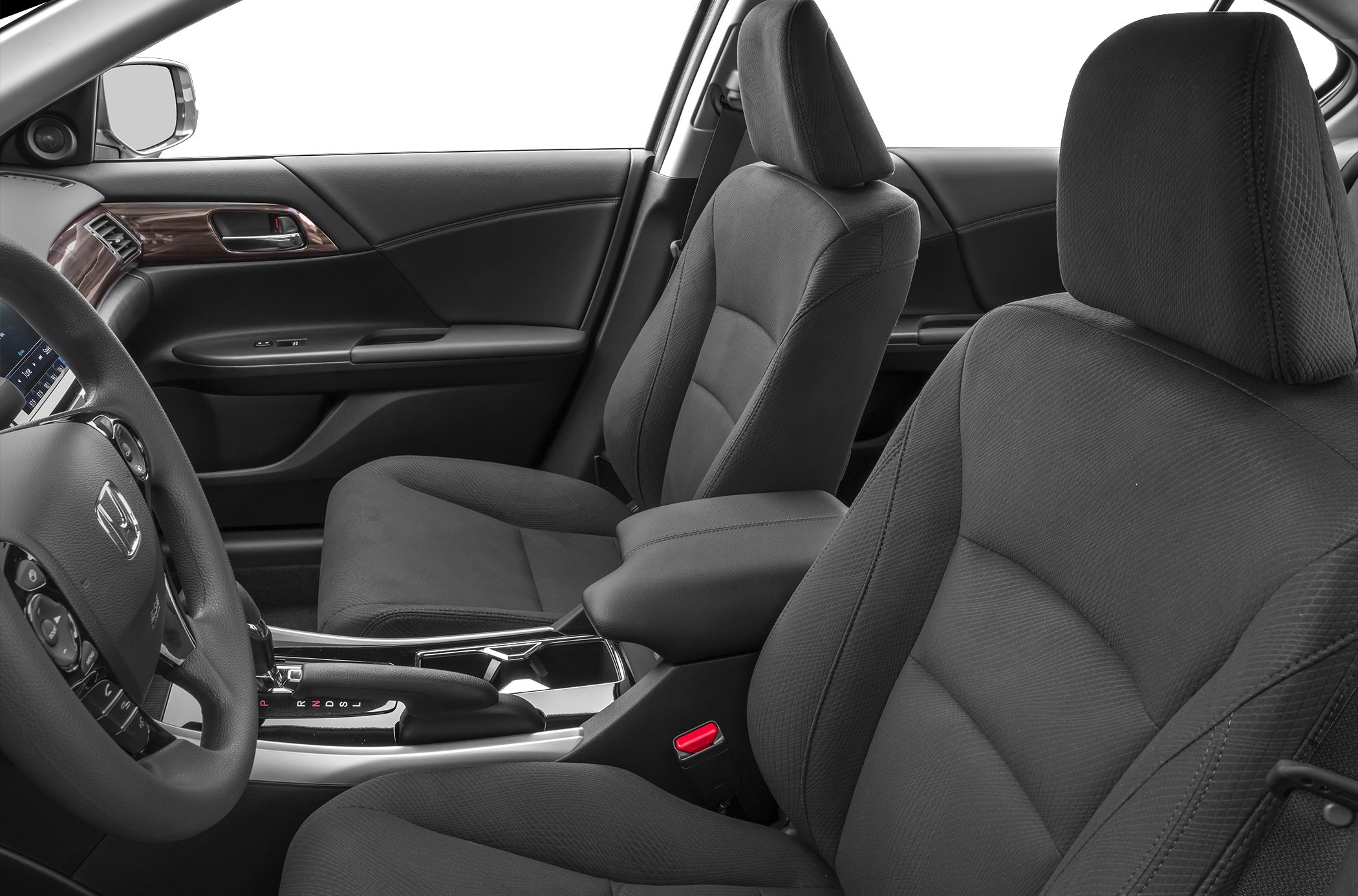 Front seats and central console with gear selector and steering wheel
