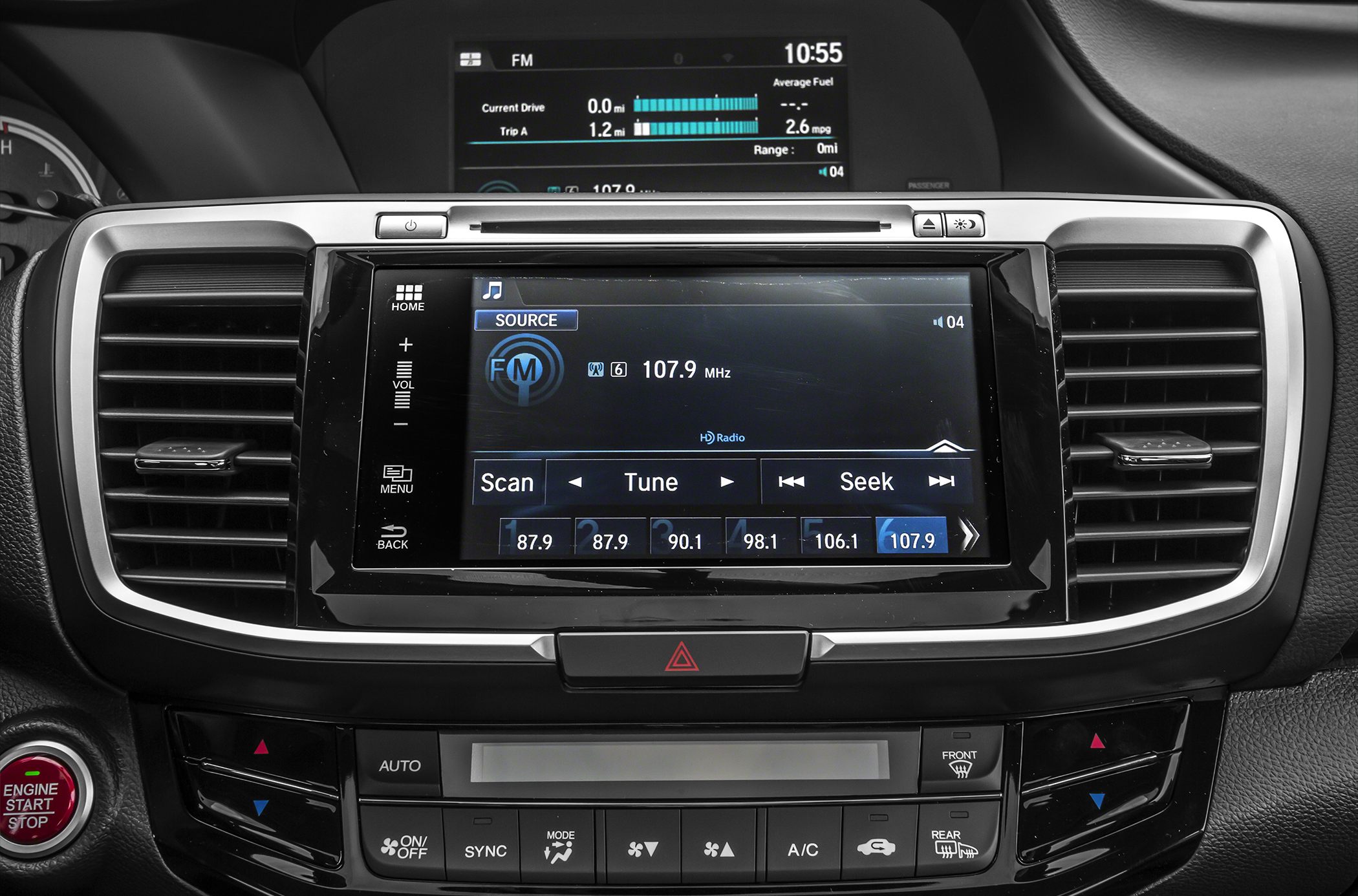 Infotainment touchscreen and climate control panel with engine start button