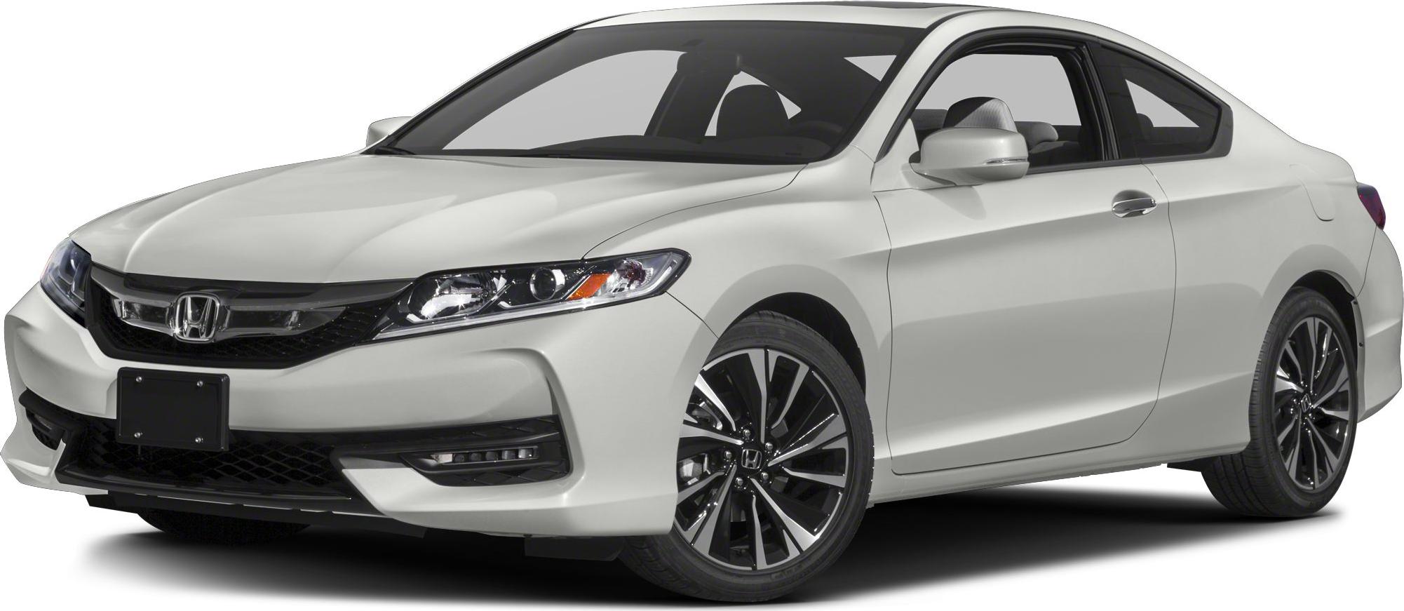 Sleek white coupe with LED headlights and black alloy wheels.