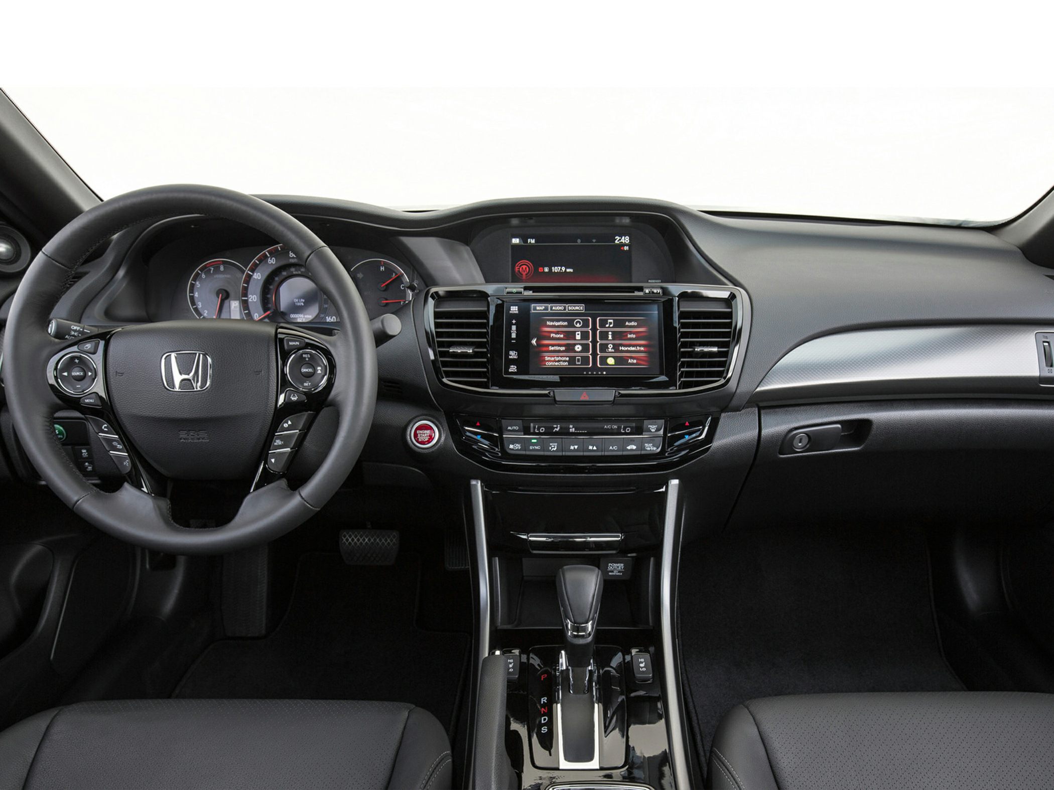 Modern interior dashboard with touchscreen infotainment and automatic transmission