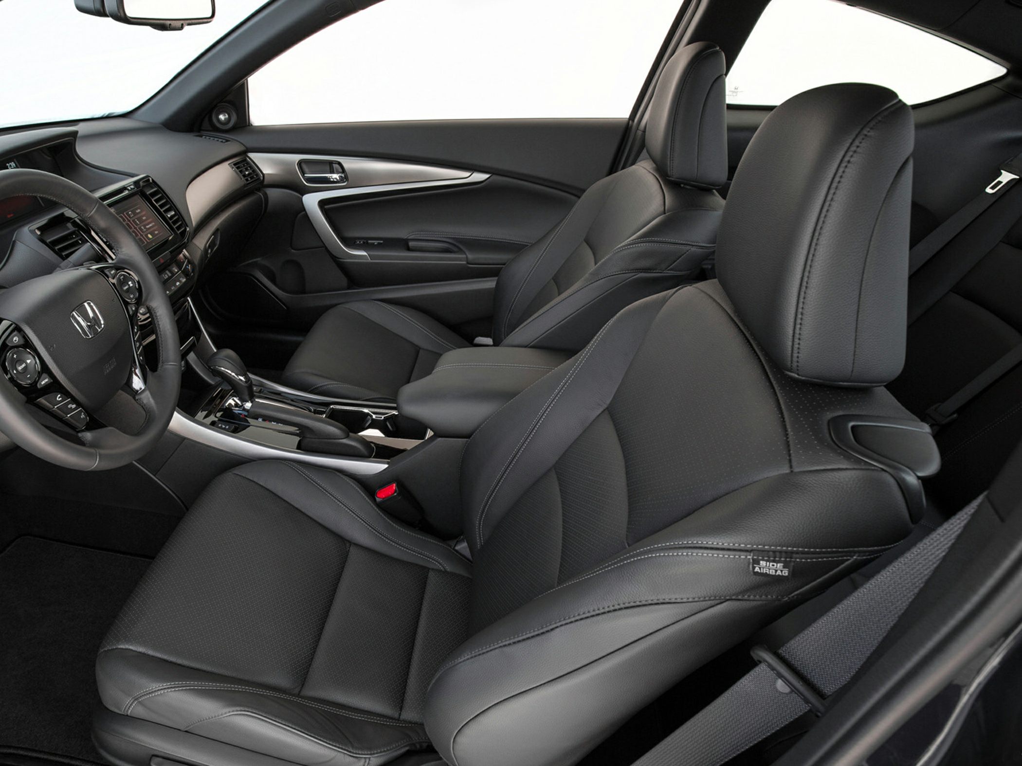 Black leather seats and modern dashboard with center console