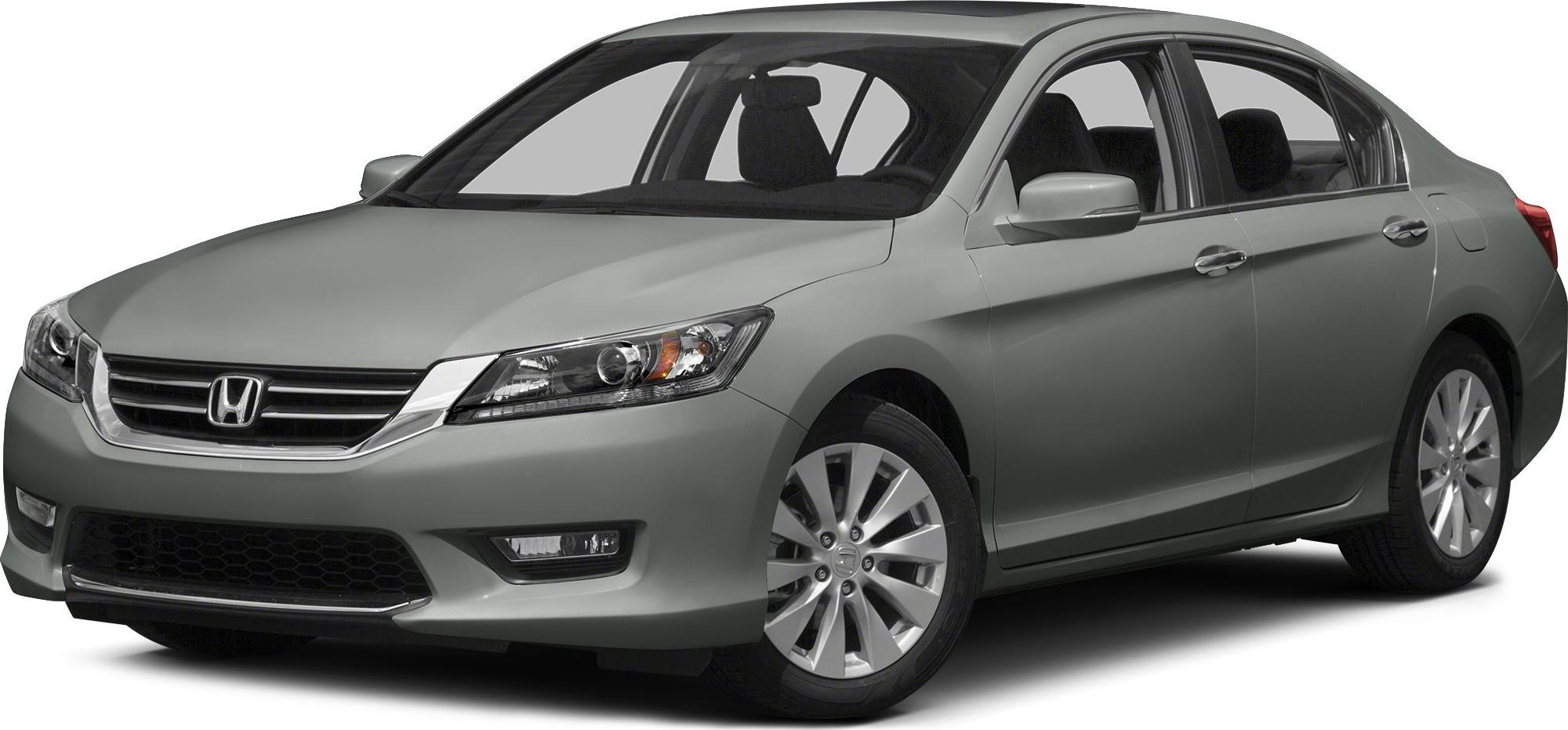 Front side exterior view with headlight, grille, and alloy wheels
