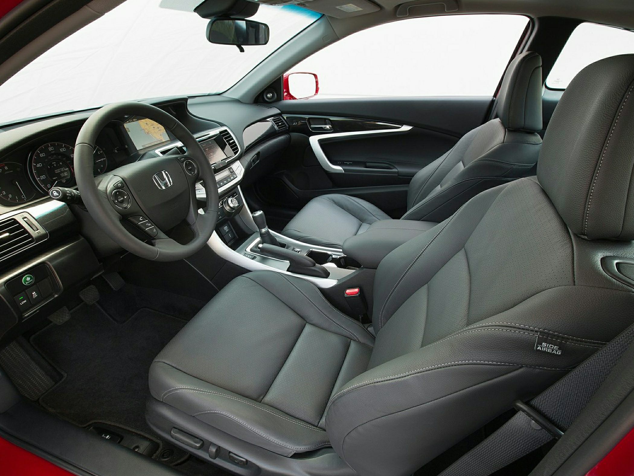 Comfortable leather seats and modern dashboard with ergonomic controls