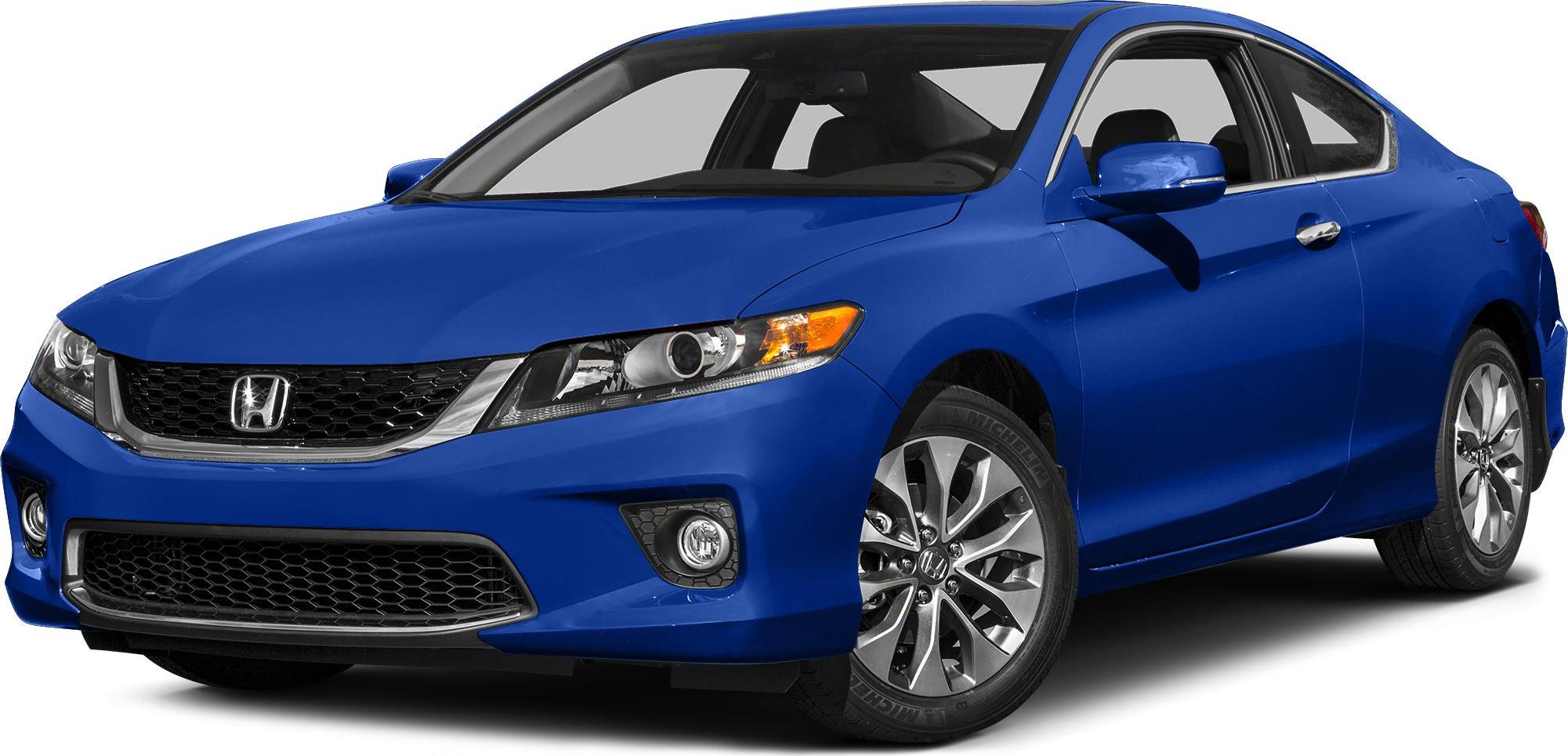 Sporty blue coupe with sleek front grille and alloy wheels