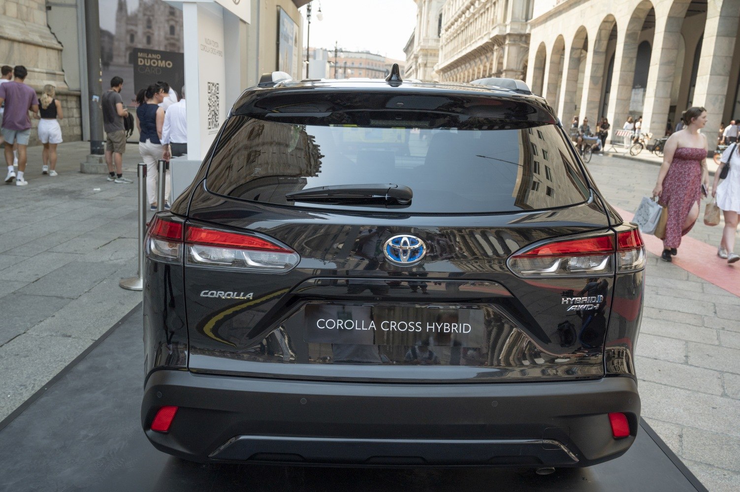 Rear view of a compact SUV with hybrid badging and modern tail lights