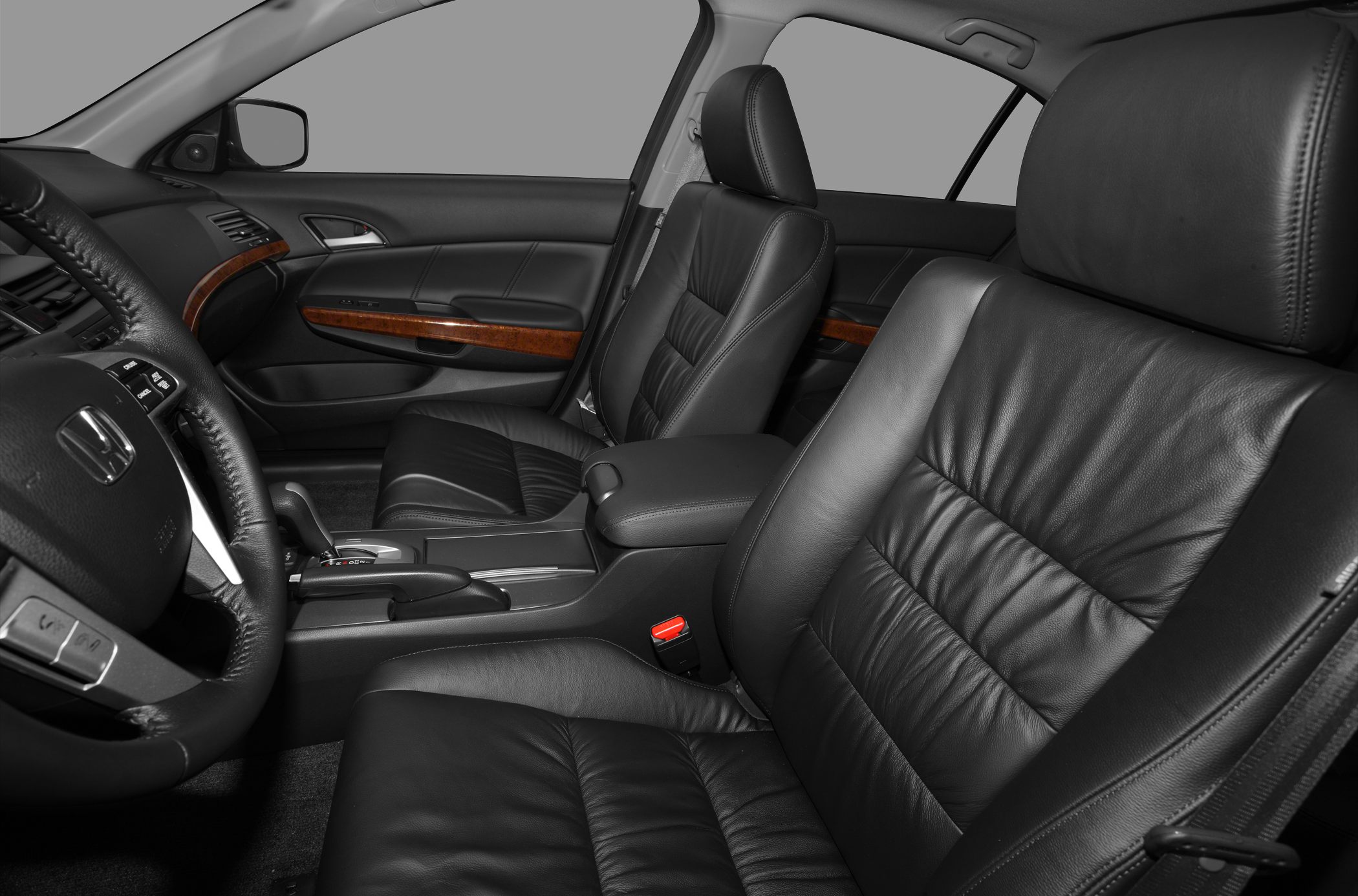 Leather seats and wood trim interior with front cabin details