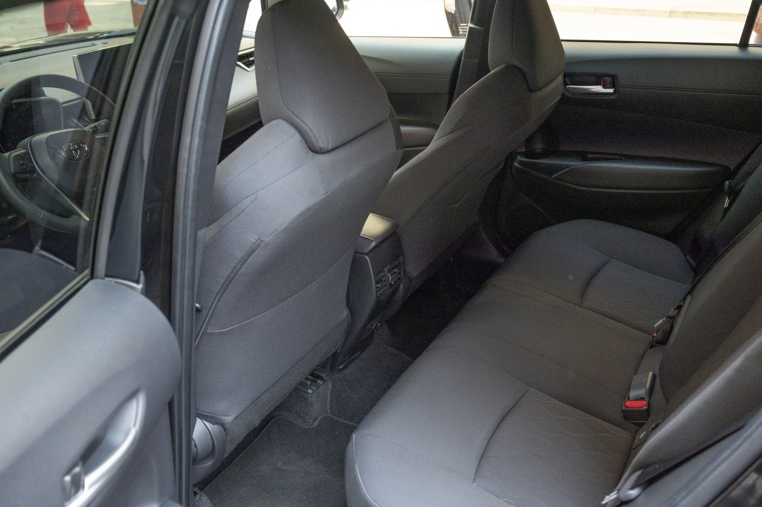 Rear interior cabin with spacious fabric back seats and front seat backs