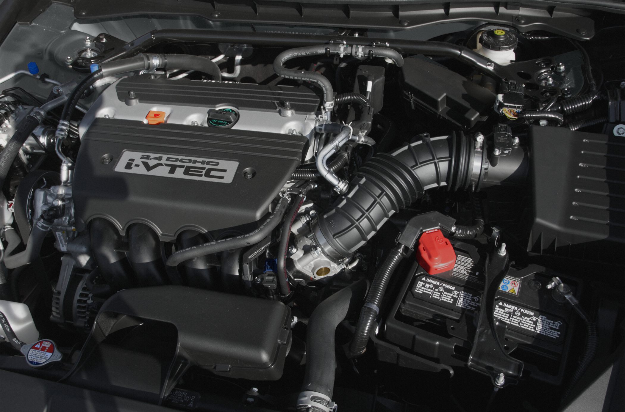 2.4 DOHC i-VTEC engine bay with intake and battery components