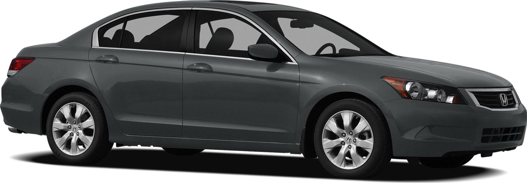 Side profile of a grey sedan with alloy wheels and sharp headlights