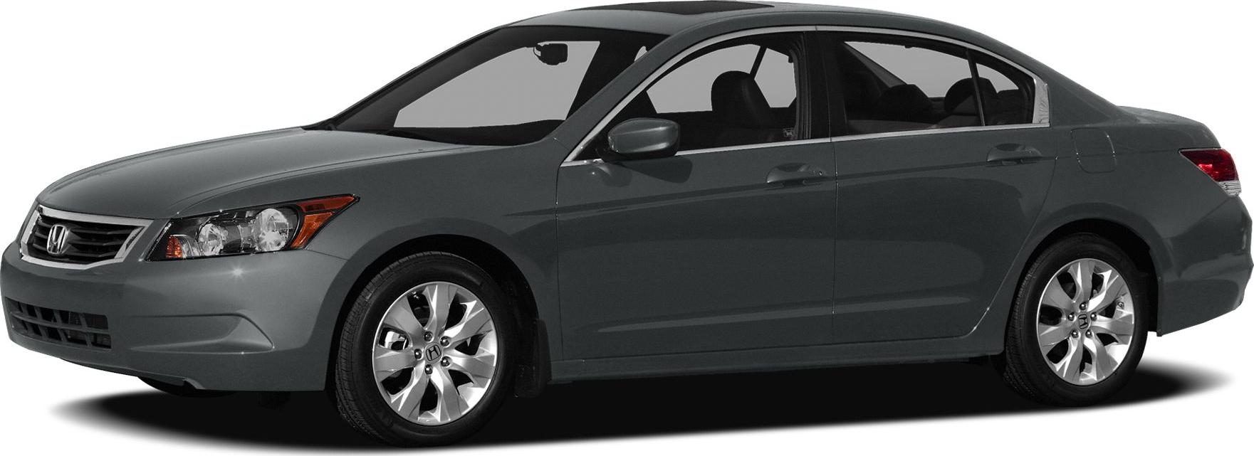 Side profile of a sedan with alloy wheels and four doors