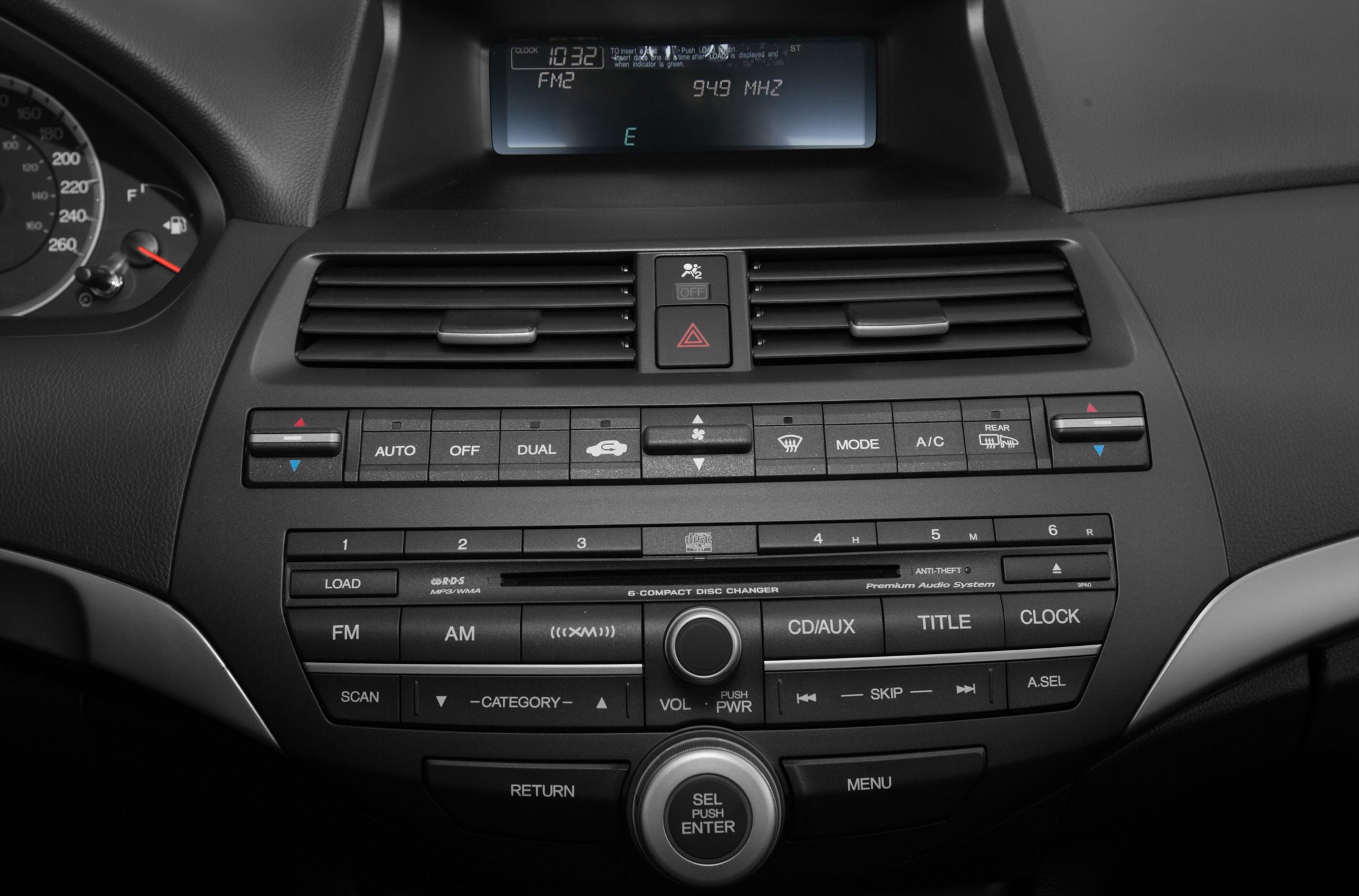 Car radio and climate control panel with CD changer and dual climate settings