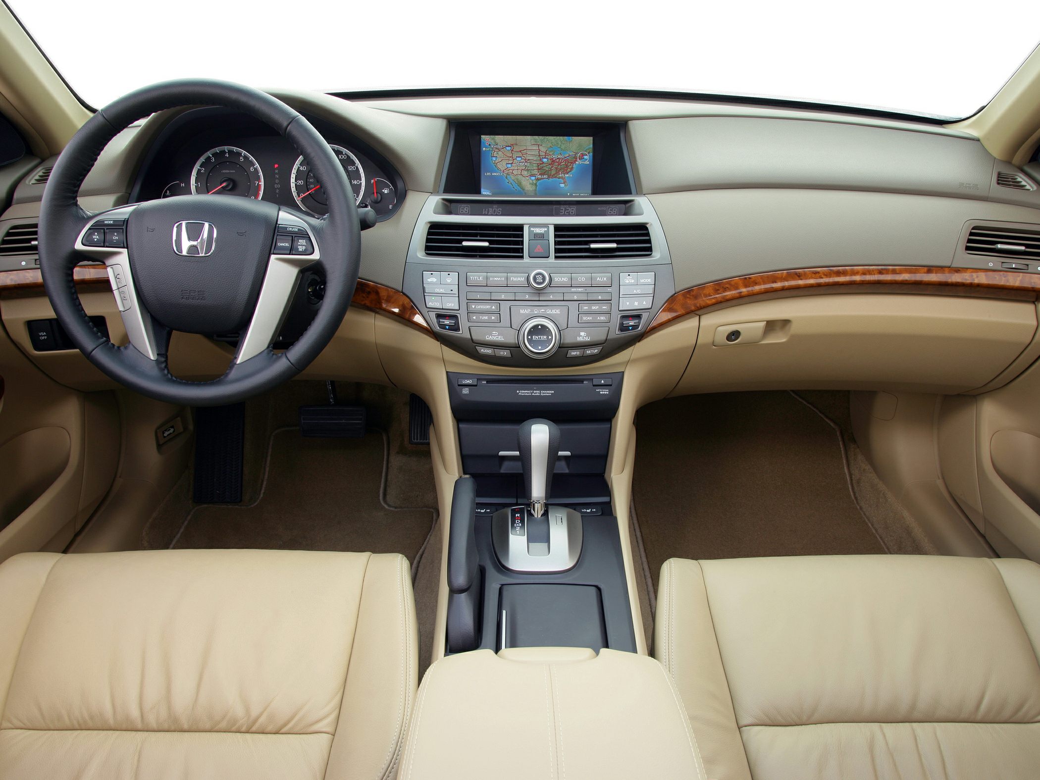 Beige leather interior with dashboard and navigation system