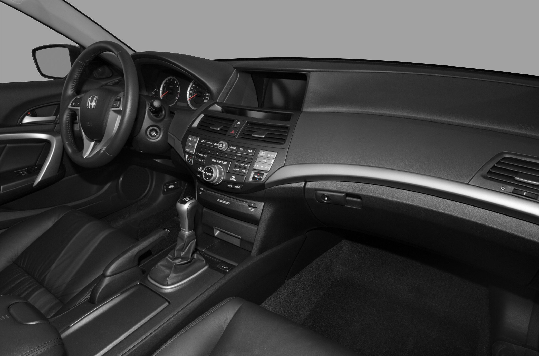 Dashboard with steering wheel and manual gear shift