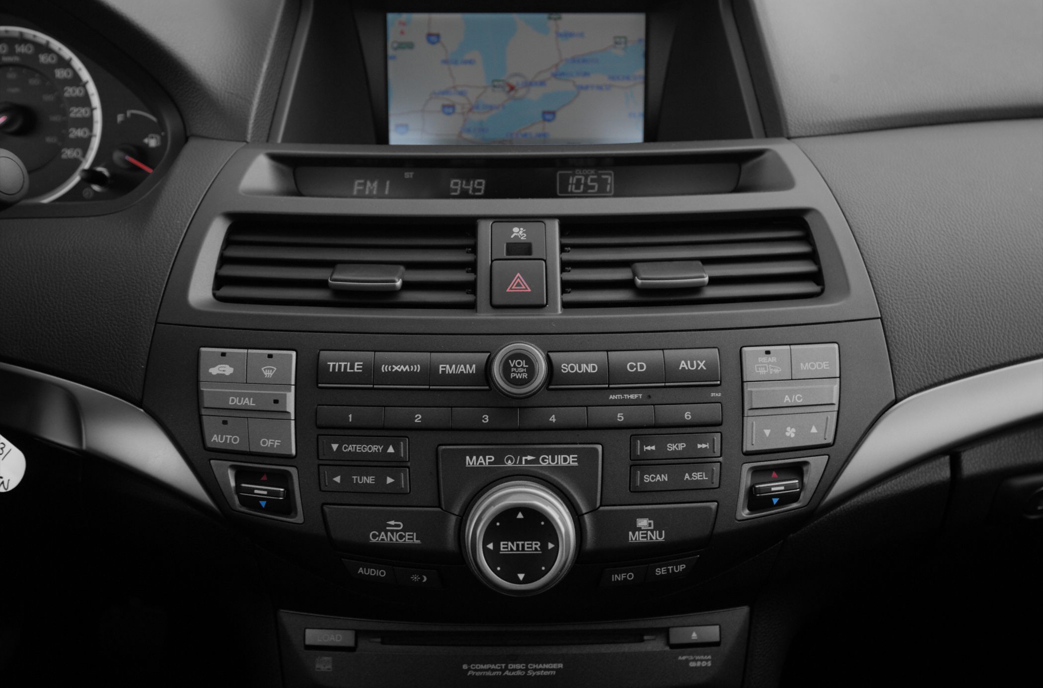 Dashboard with navigation screen, audio, and climate control buttons