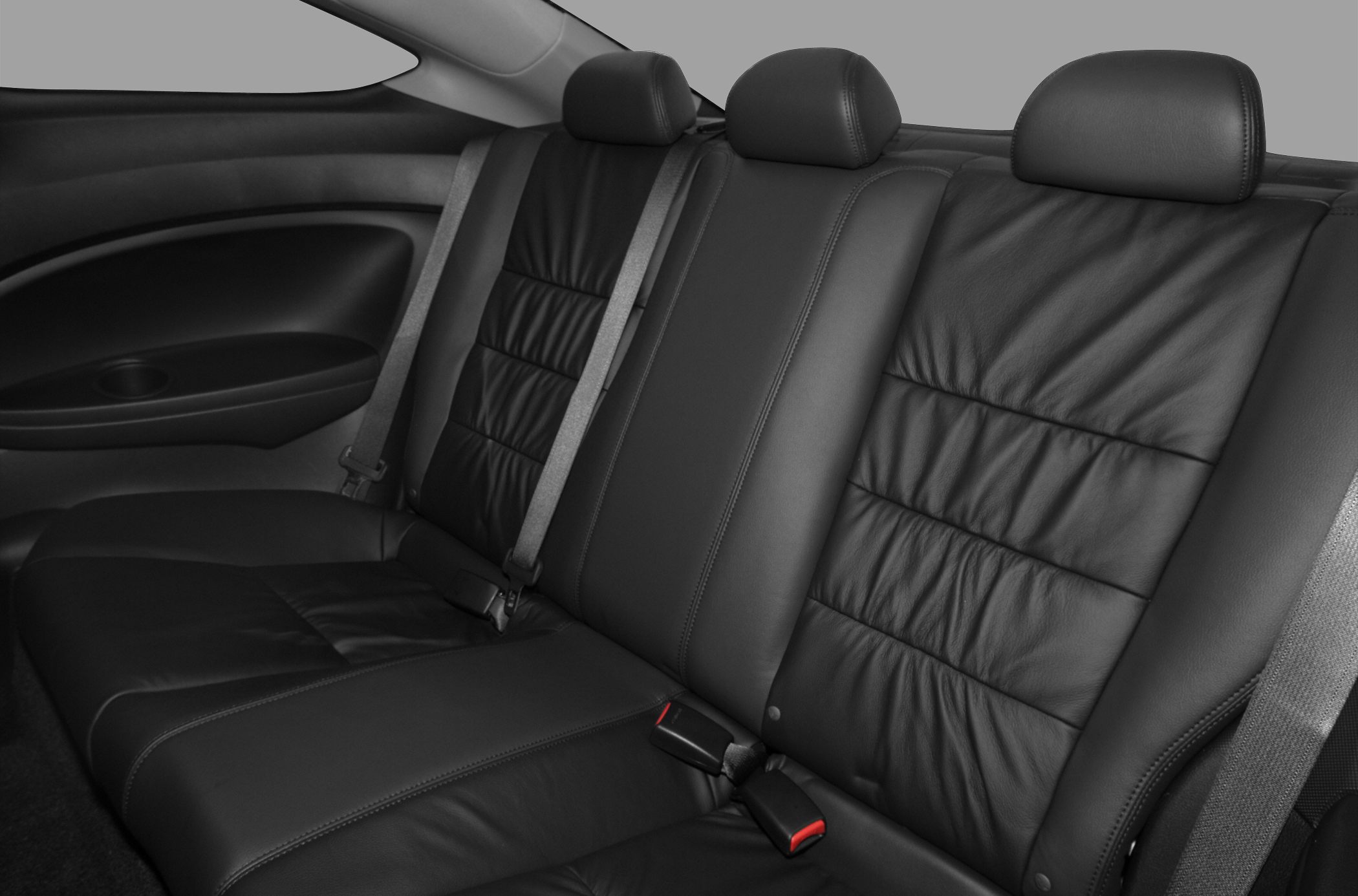 Rear leather seats with headrests and seat belts