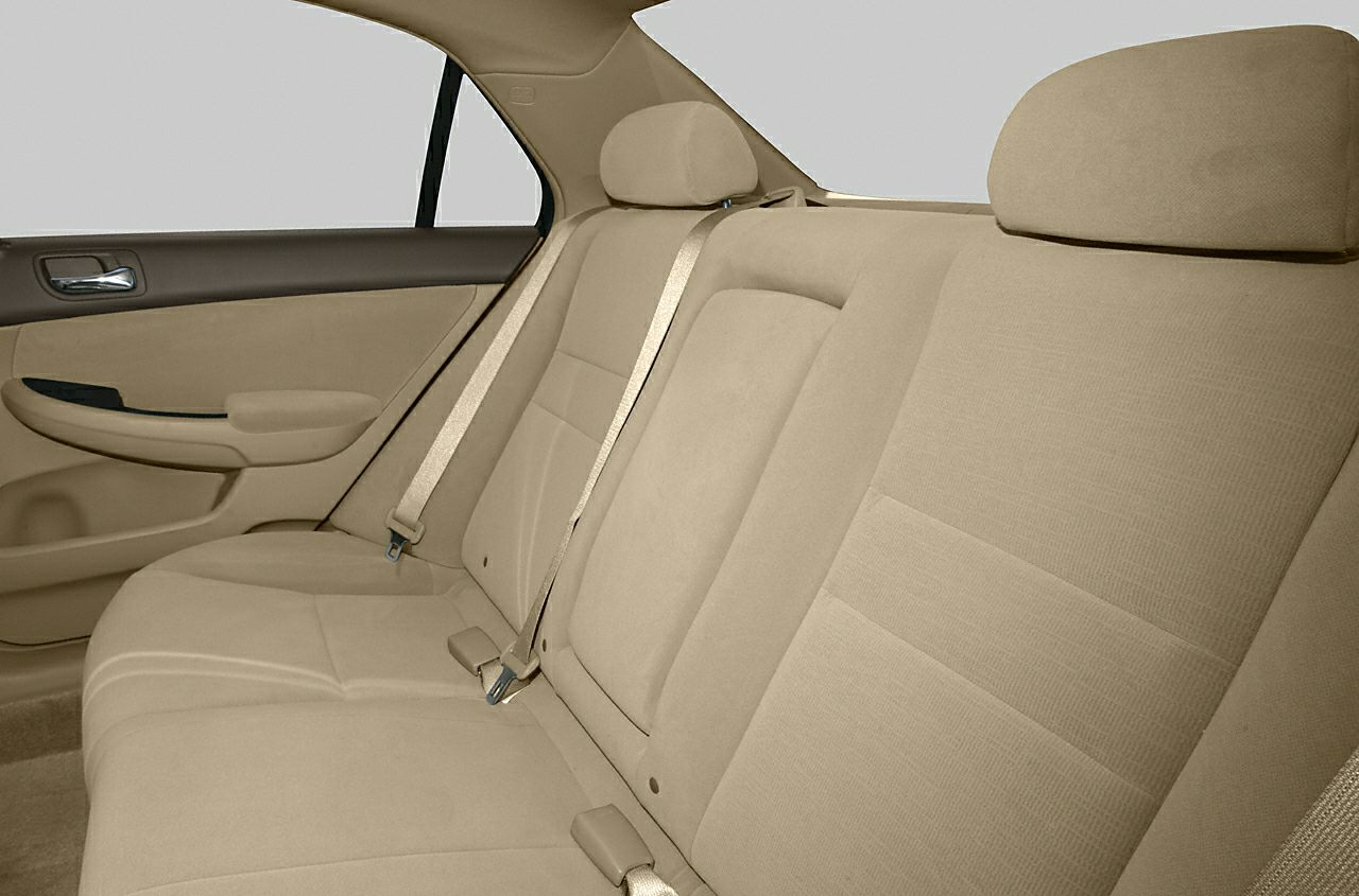 Beige cloth rear seat with seatbelts and headrests