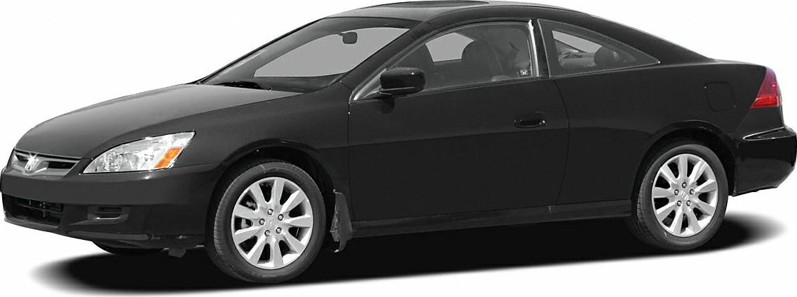 Sleek side view of mid-2000s coupe with alloy wheels