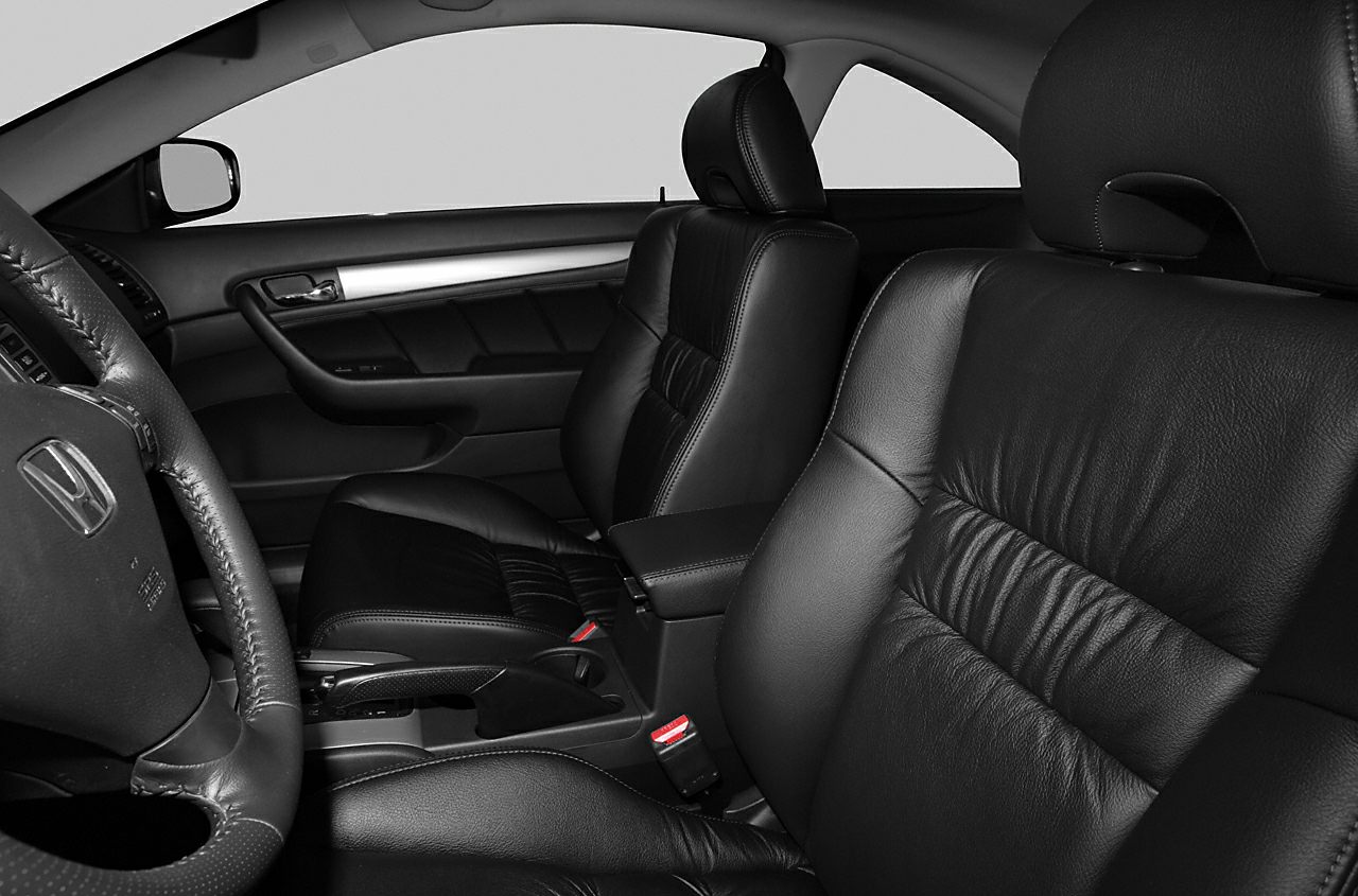 Black leather front seats and interior door panel with steering wheel
