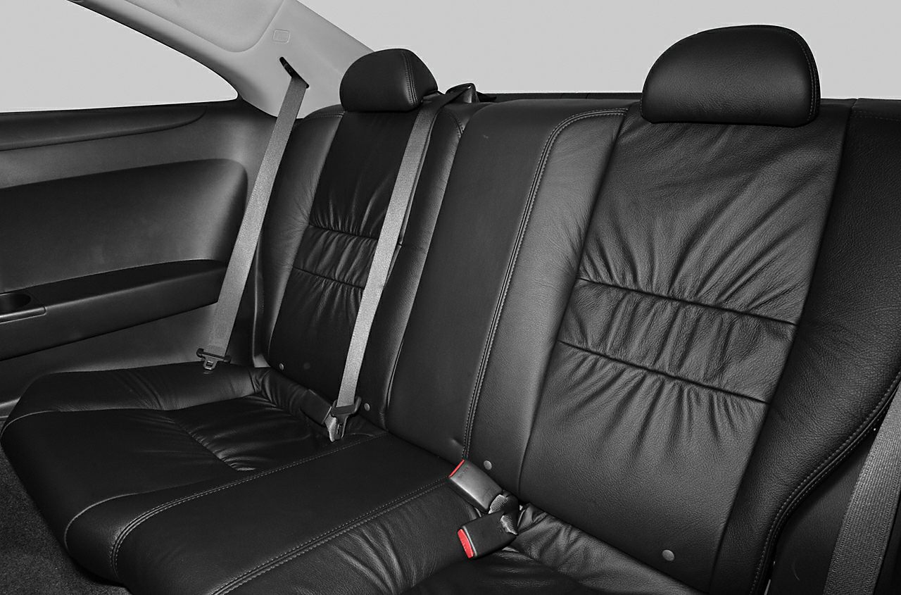 Black leather rear seats with seat belts and headrests
