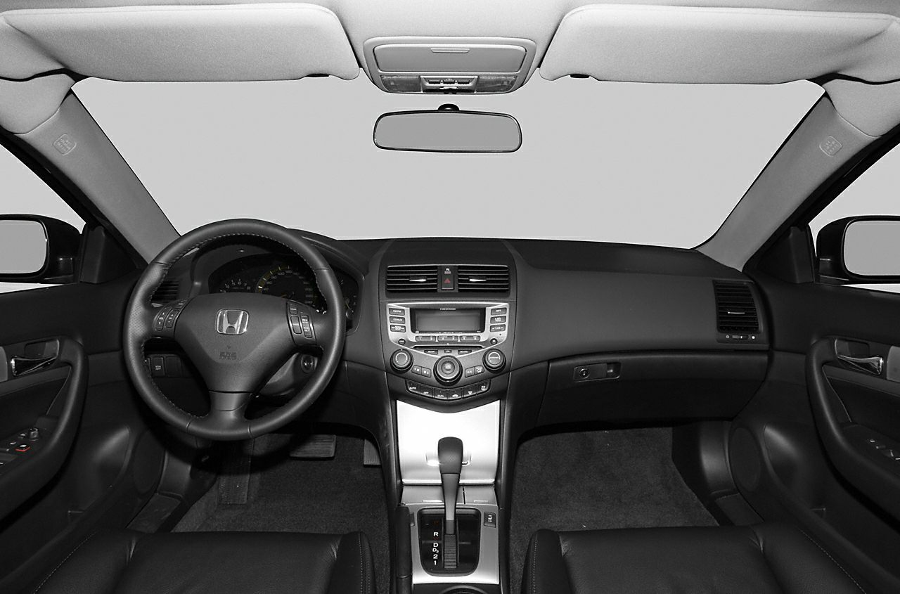 Dashboard, steering wheel, and center console interior view