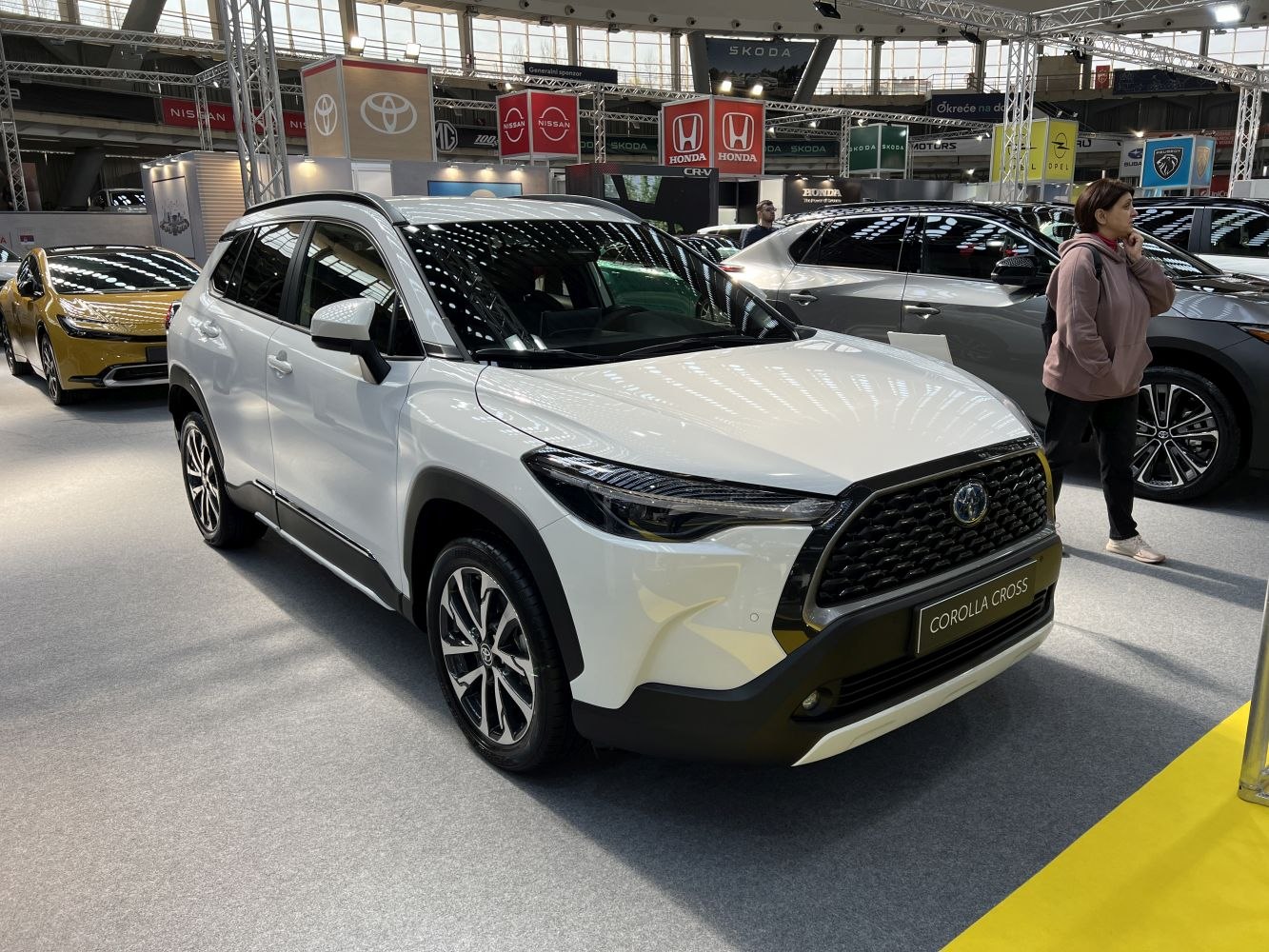 Front view of SUV with distinctive grille and LED headlights