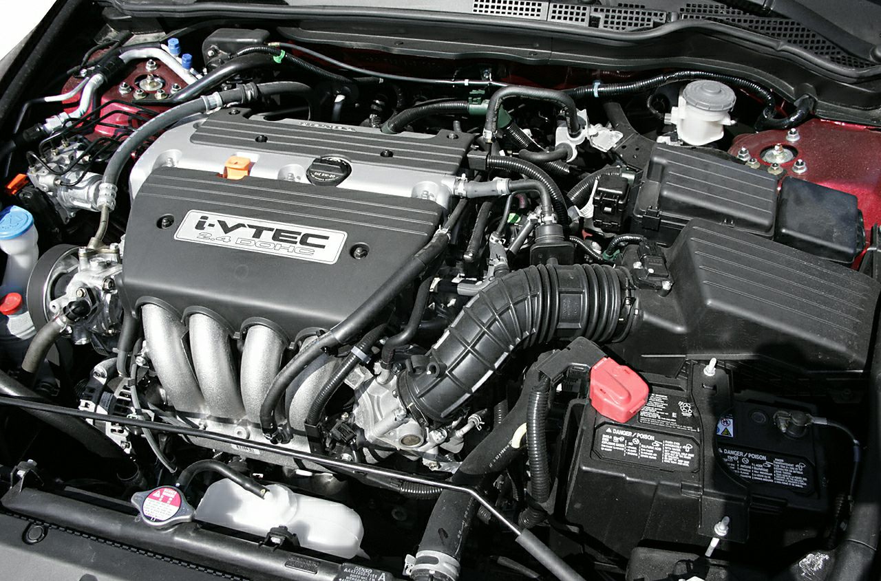 2.4L i-VTEC engine bay with intake manifold and battery