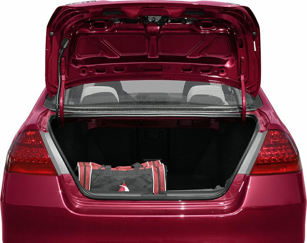 Open trunk with ample cargo space and a bag inside