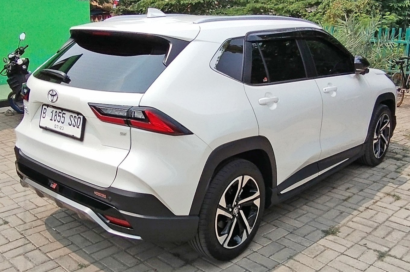 Rear and side profile of a compact SUV with sporty tail lights and alloy wheels