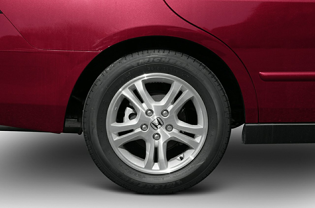 Alloy wheel and rear fender in red with Michelin tire