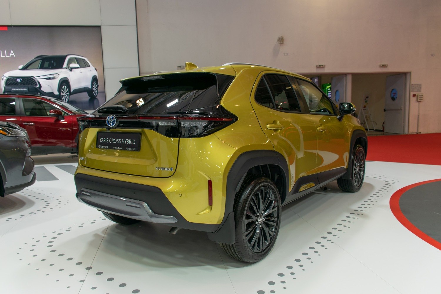 Rear view of hybrid SUV with distinctive taillights and rugged bumper