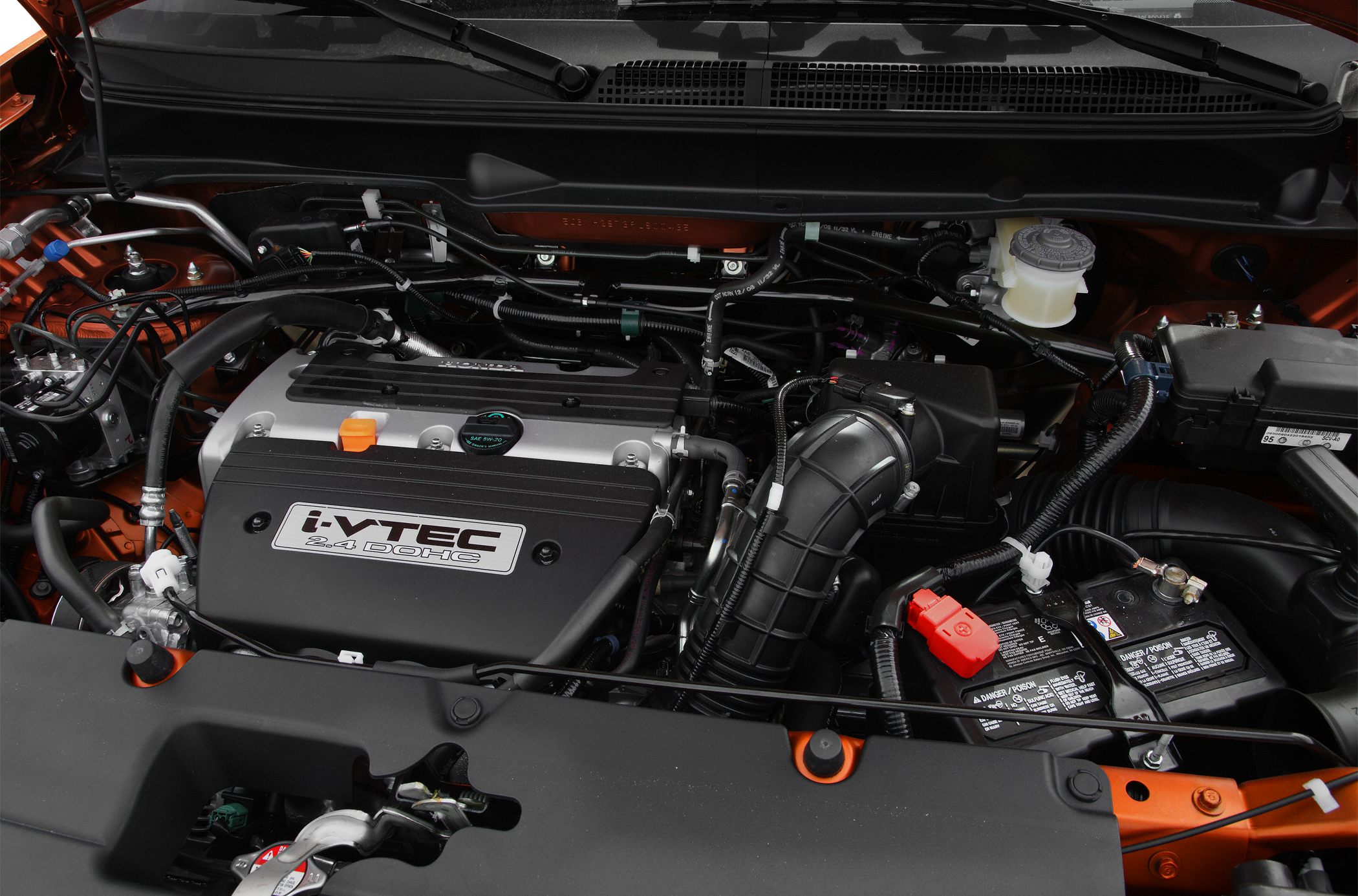 Detailed view of i-VTEC 2.4 DOHC engine and components.