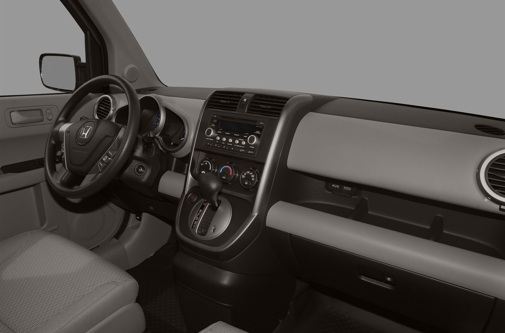 Dashboard and gear shift with climate and audio controls