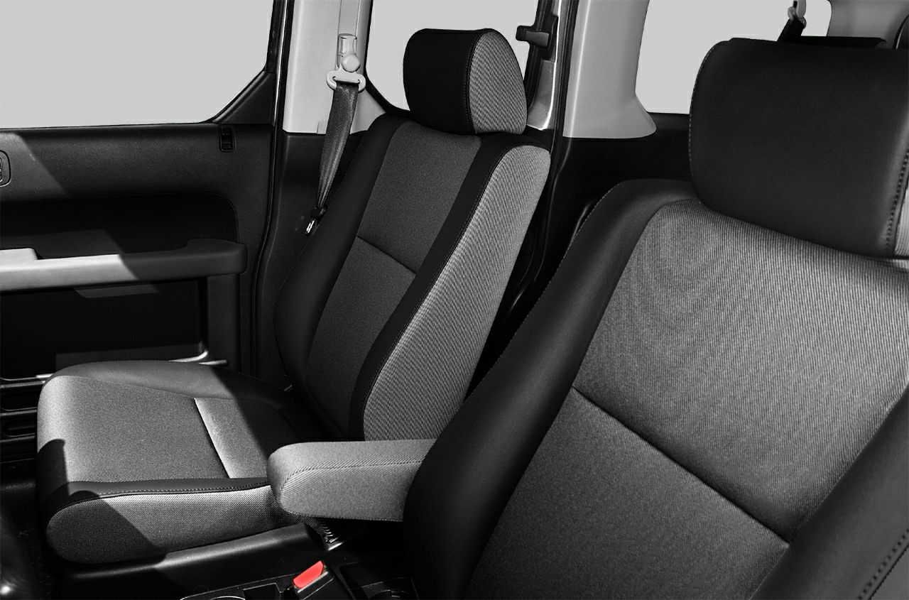 Fabric upholstered front seats with headrests and armrest