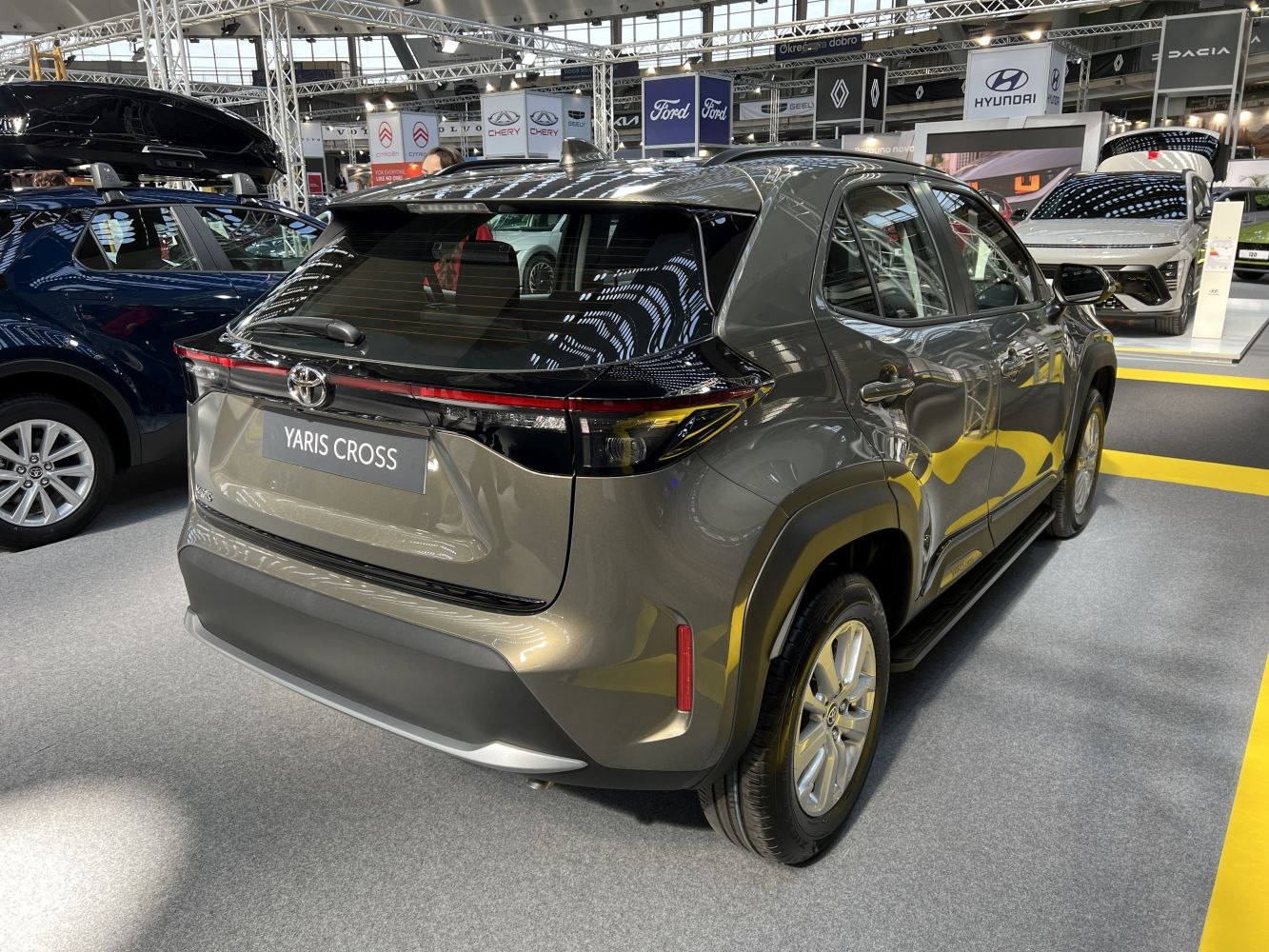Rear and side view with distinctive taillights and body contours