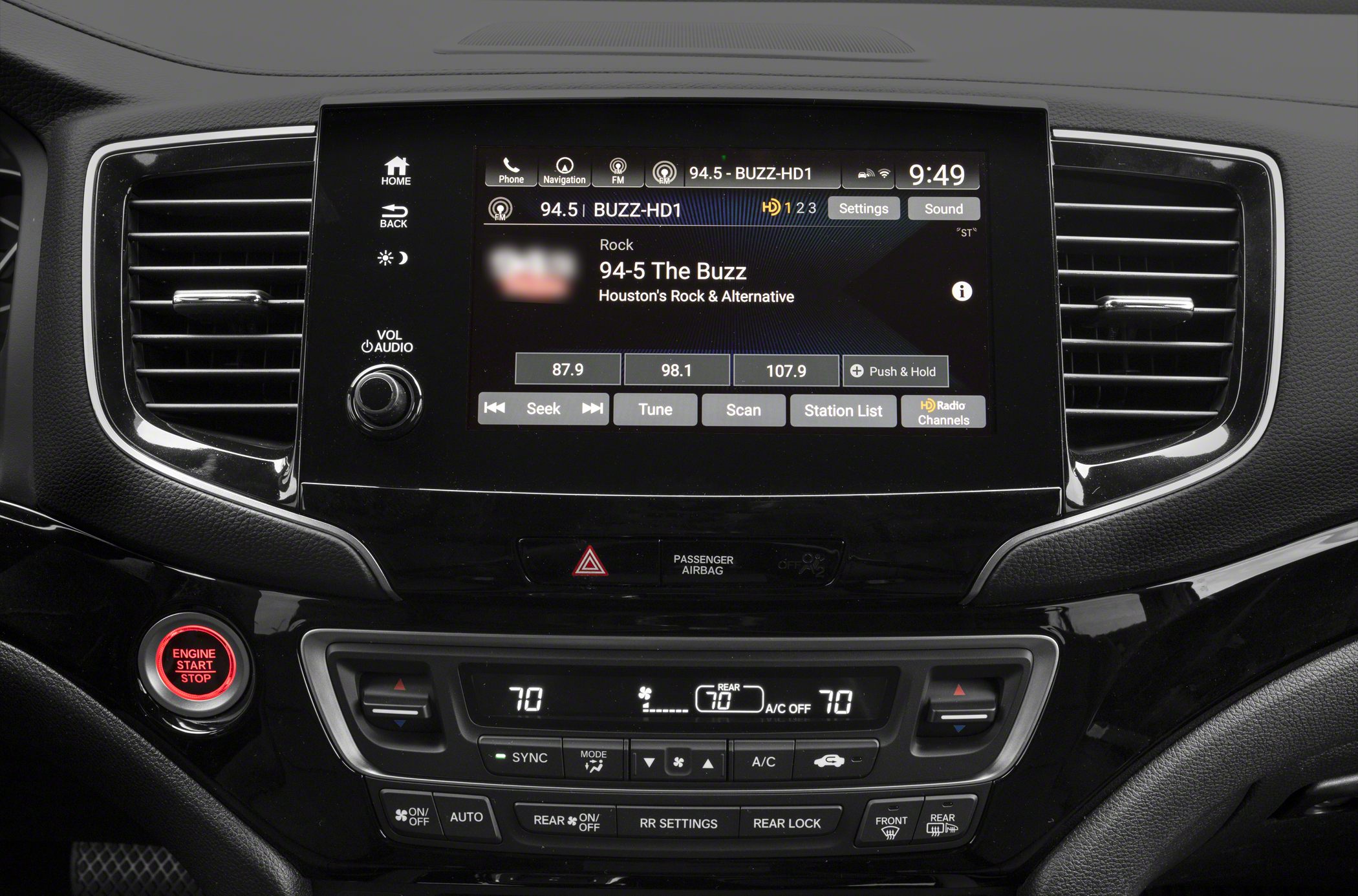 Touchscreen infotainment with climate control and engine start button
